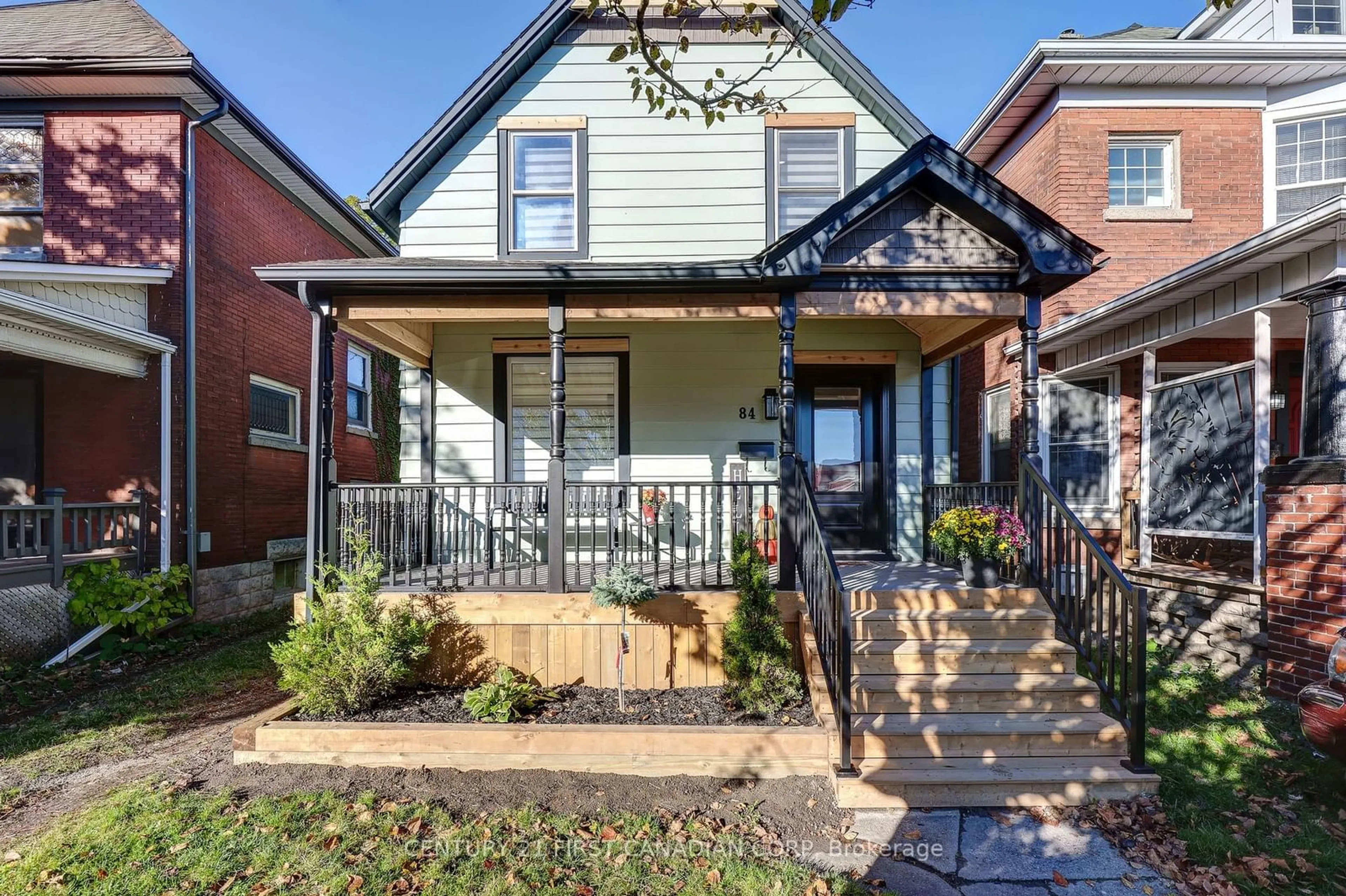 Frontside or backside of a home, the fenced backyard for 84 ROSS St, St. Thomas Ontario N5R 3X7