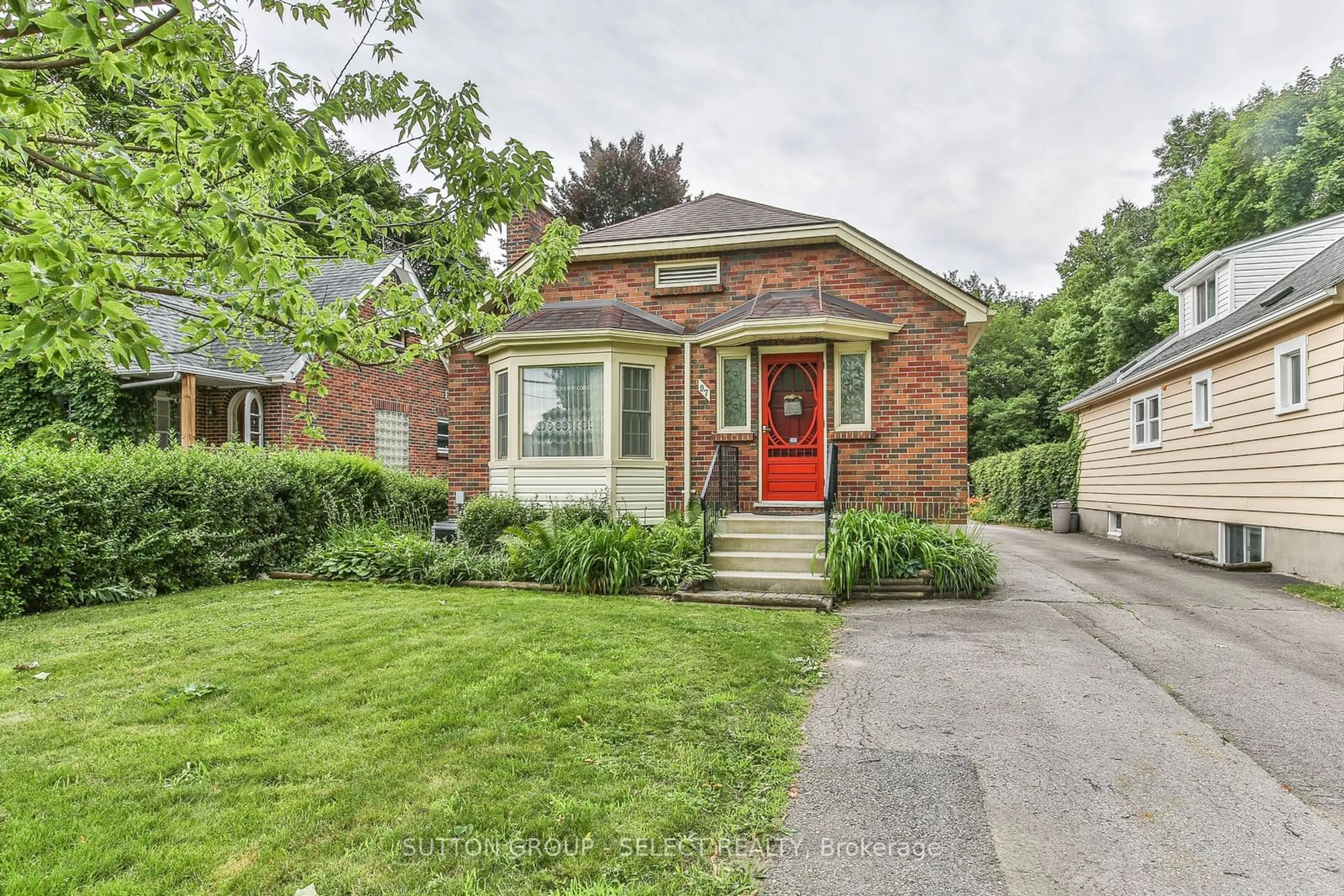 Home with brick exterior material for 97 Huron St, London Ontario N6A 2H9