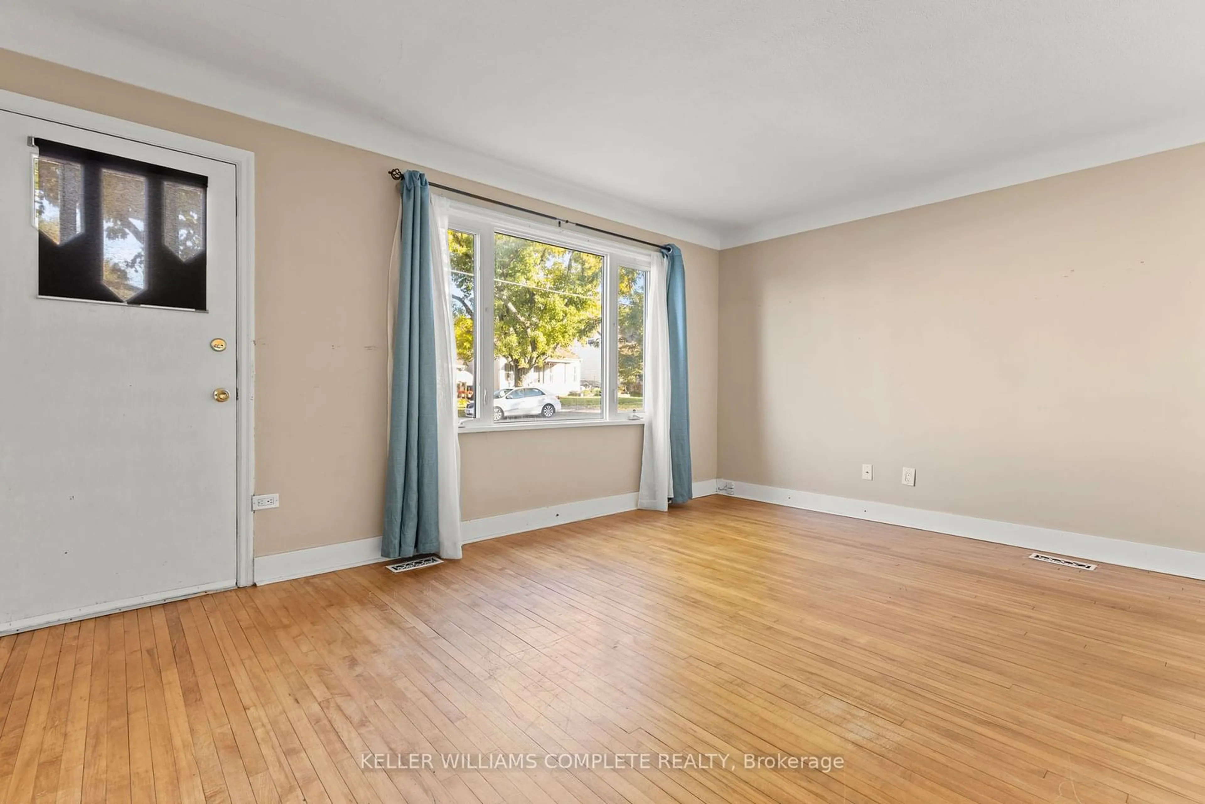 A pic of a room, wood floors for 15 Hayes Home, St. Catharines Ontario L2T 1N5