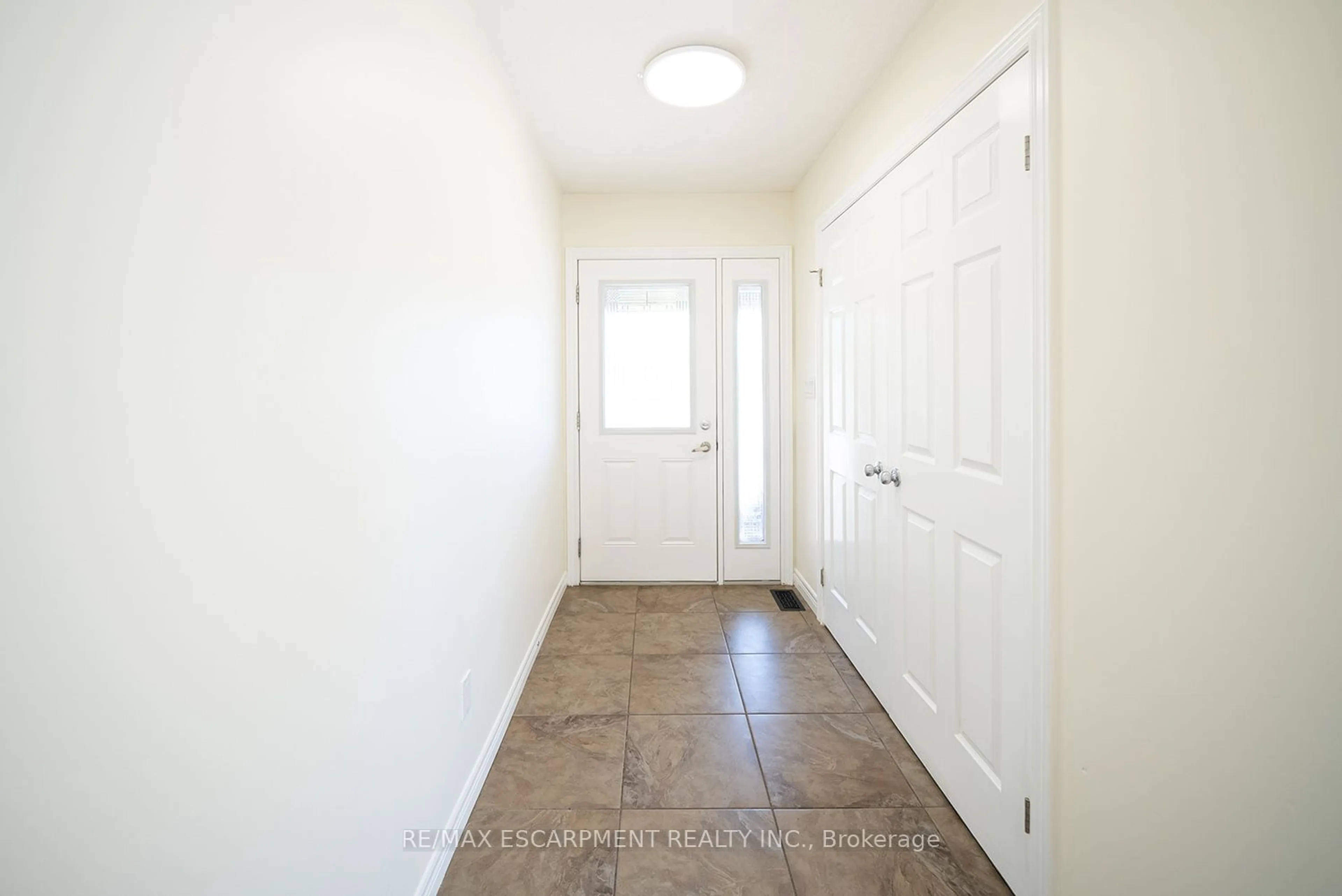 Indoor entryway, cement floor for 8 Oakes Crt, Guelph Ontario N1E 0J6