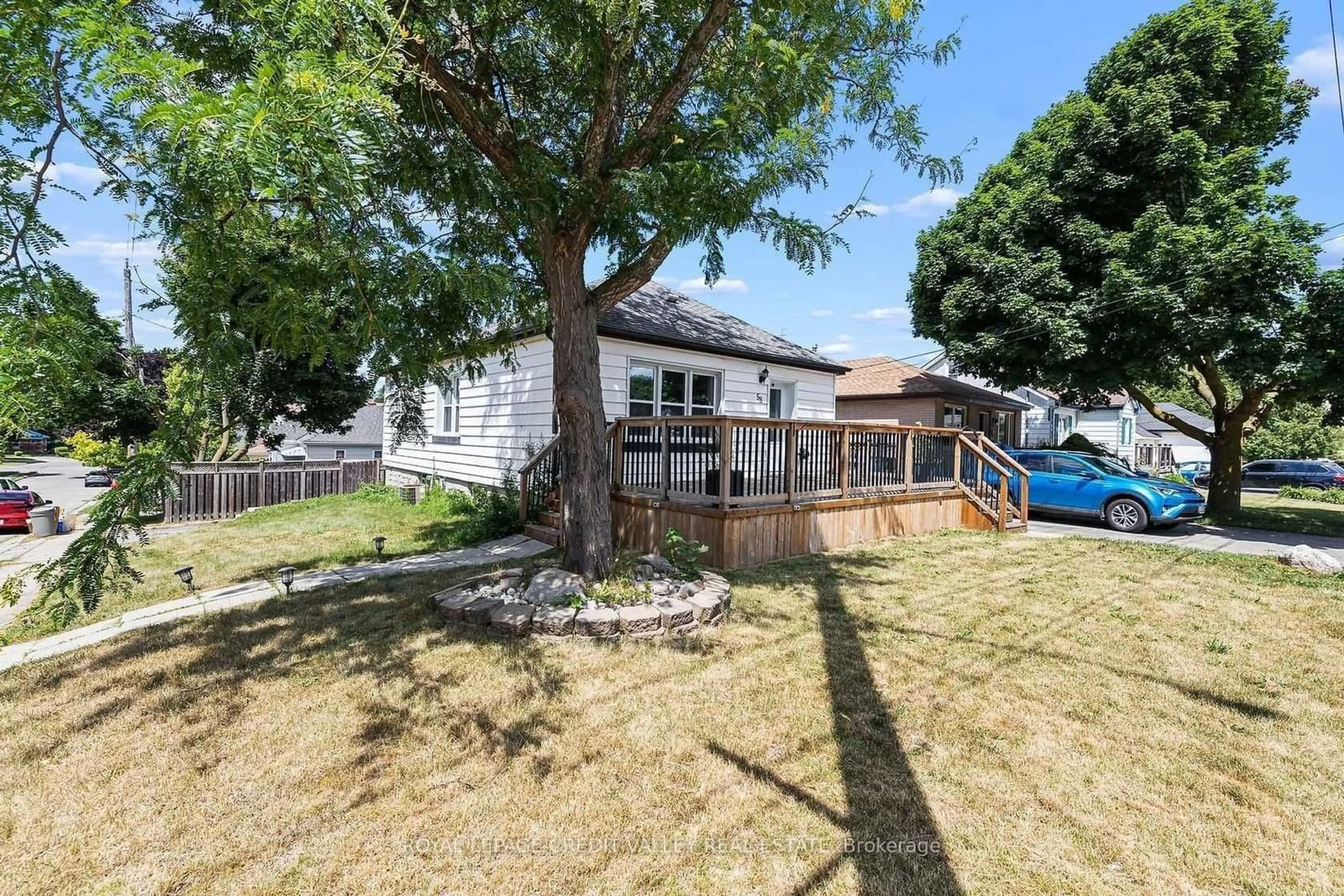 Frontside or backside of a home, the fenced backyard for 58 Henry St, Cambridge Ontario N1R 3W4