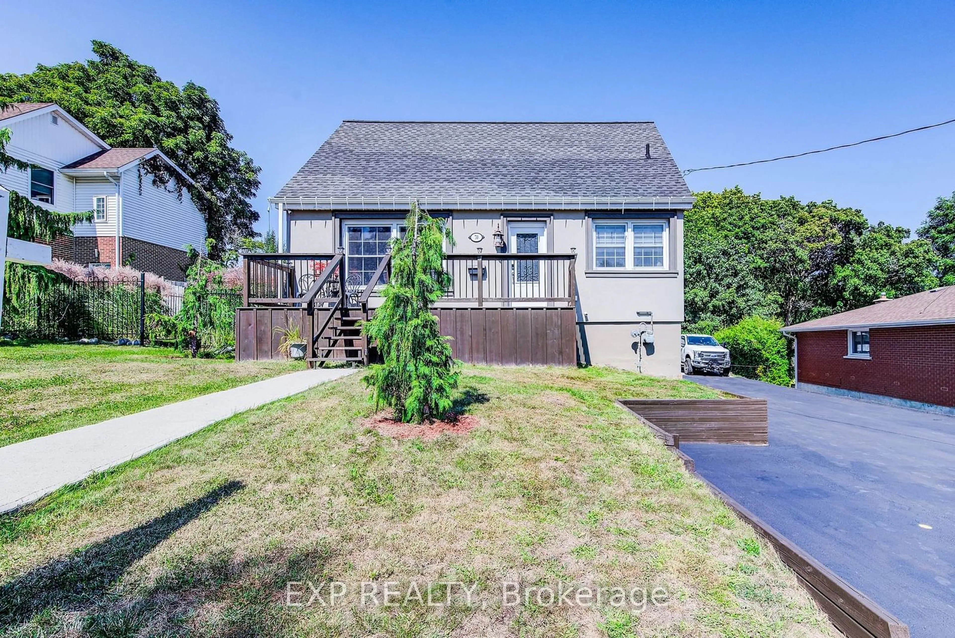 Frontside or backside of a home, the fenced backyard for 70 Stanley St, Cambridge Ontario N1S 2A6