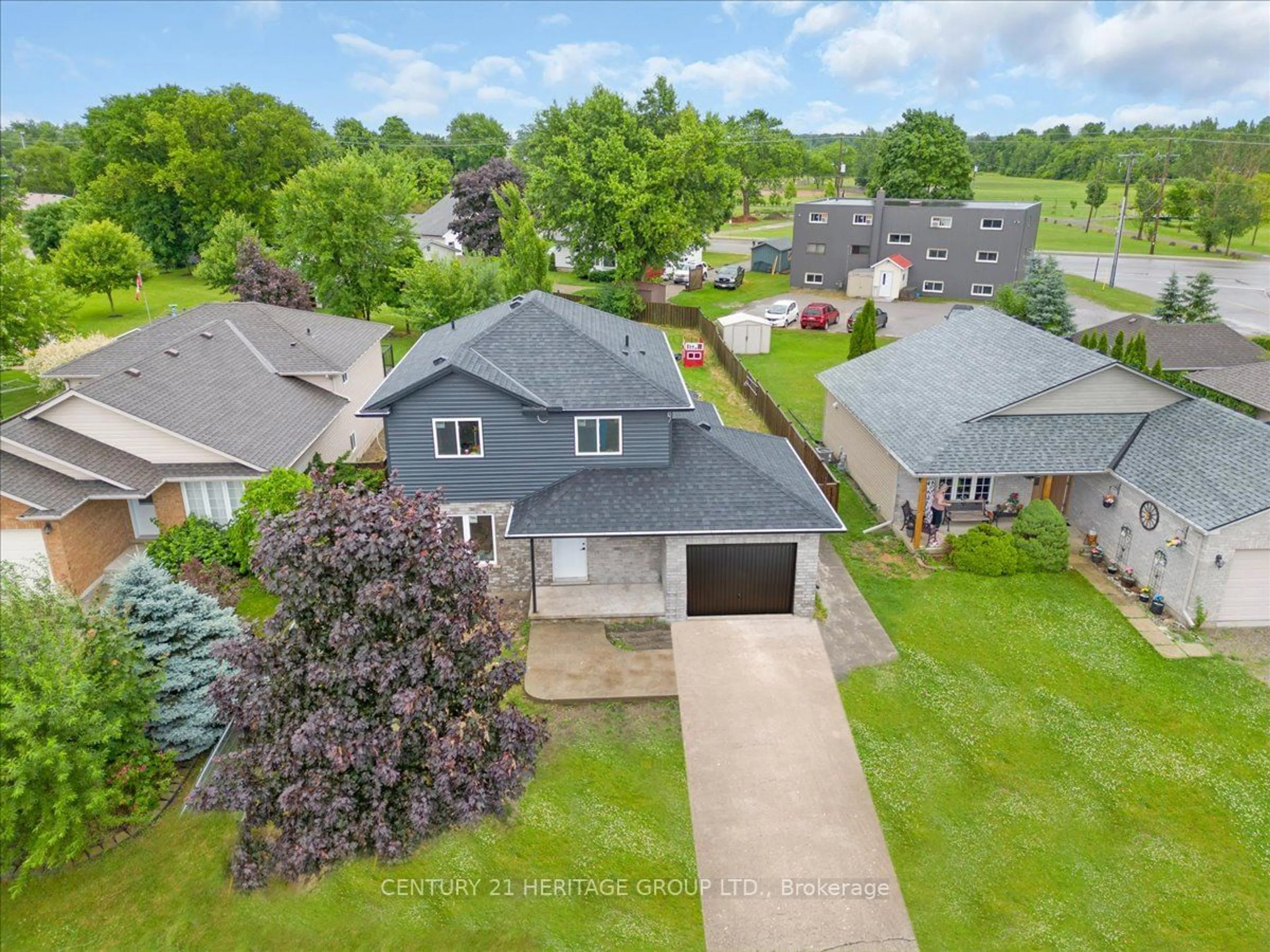 Frontside or backside of a home, the fenced backyard for 5 Vera St, Haldimand Ontario N0A 1J0