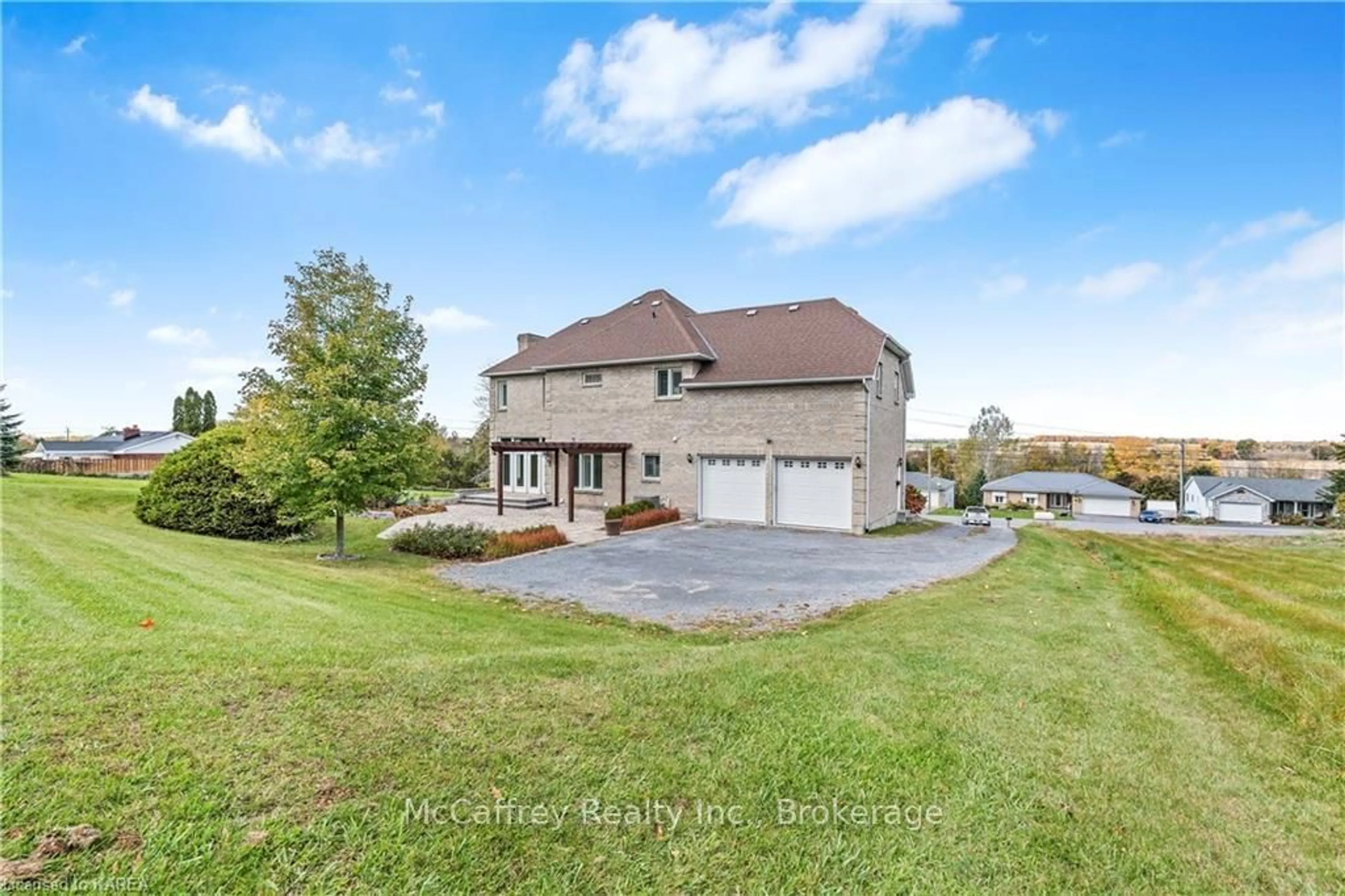 Frontside or backside of a home, the fenced backyard for 708 PALACE Rd, Greater Napanee Ontario K7R 1A7