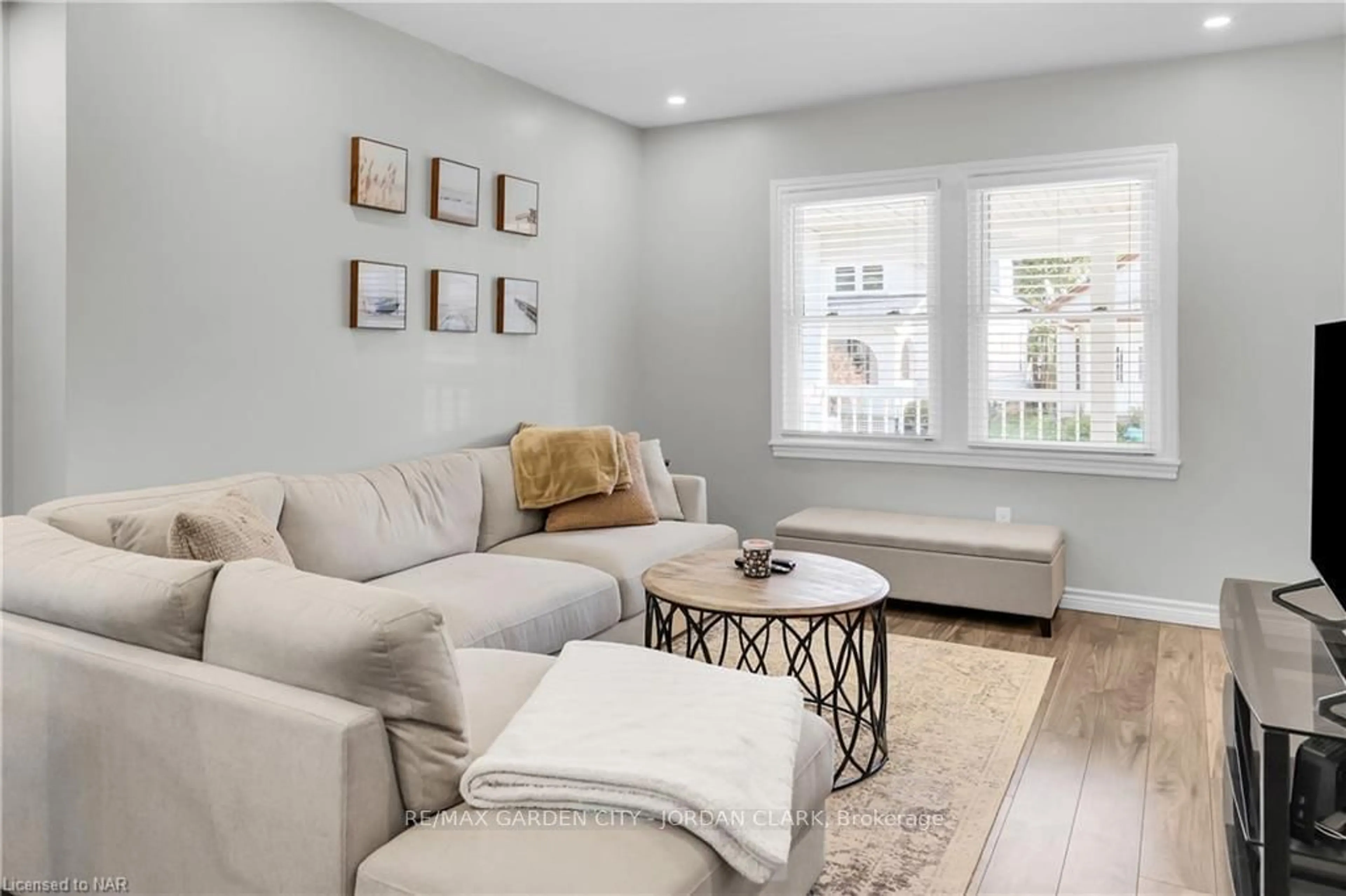 Living room, wood floors for 15 JONES St, St. Catharines Ontario L2R 6A8