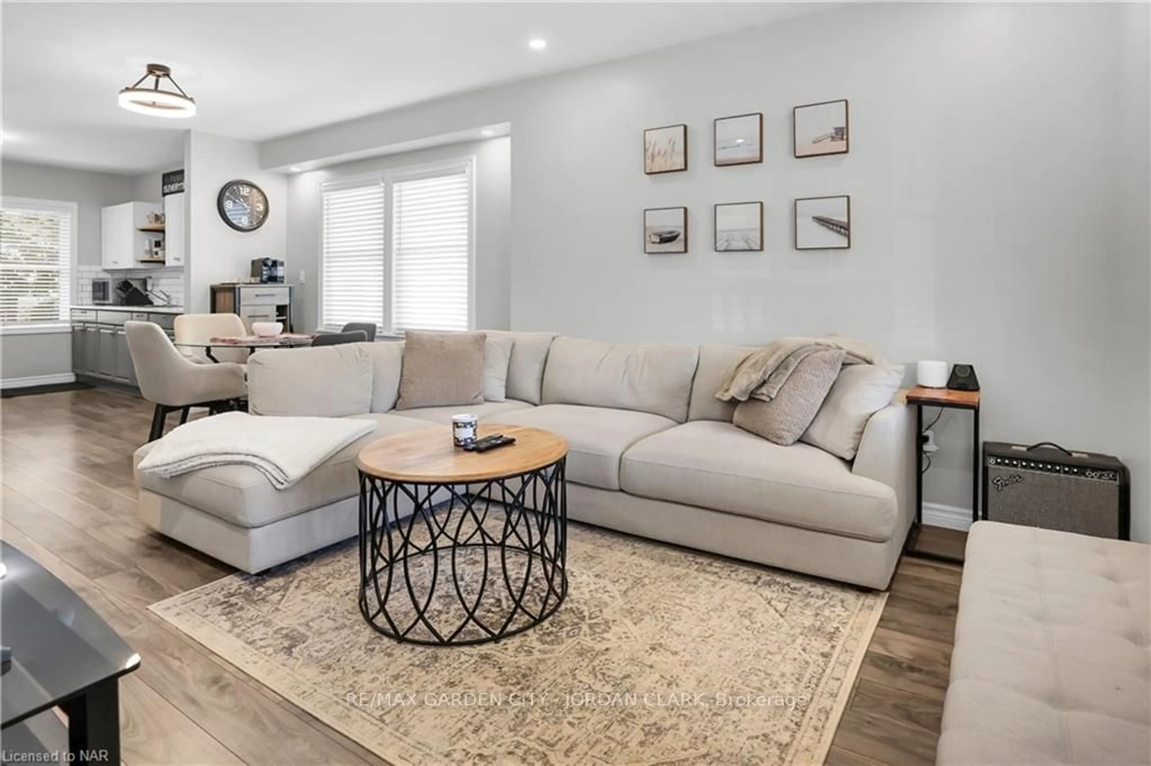 Living room, wood floors for 15 JONES St, St. Catharines Ontario L2R 6A8