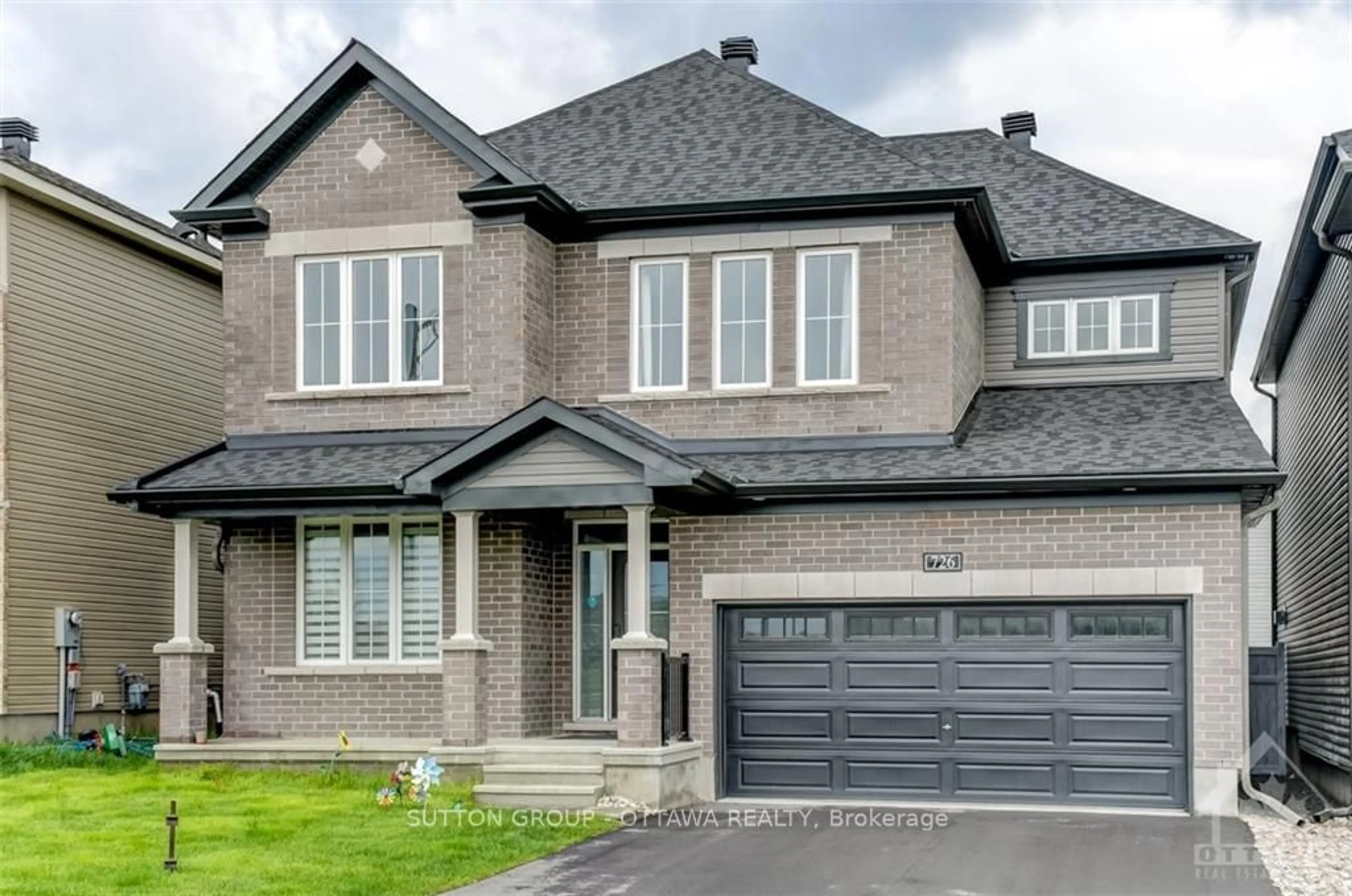 Home with brick exterior material, street for 726 CAPPAMORE Dr, Barrhaven Ontario K2J 6W3