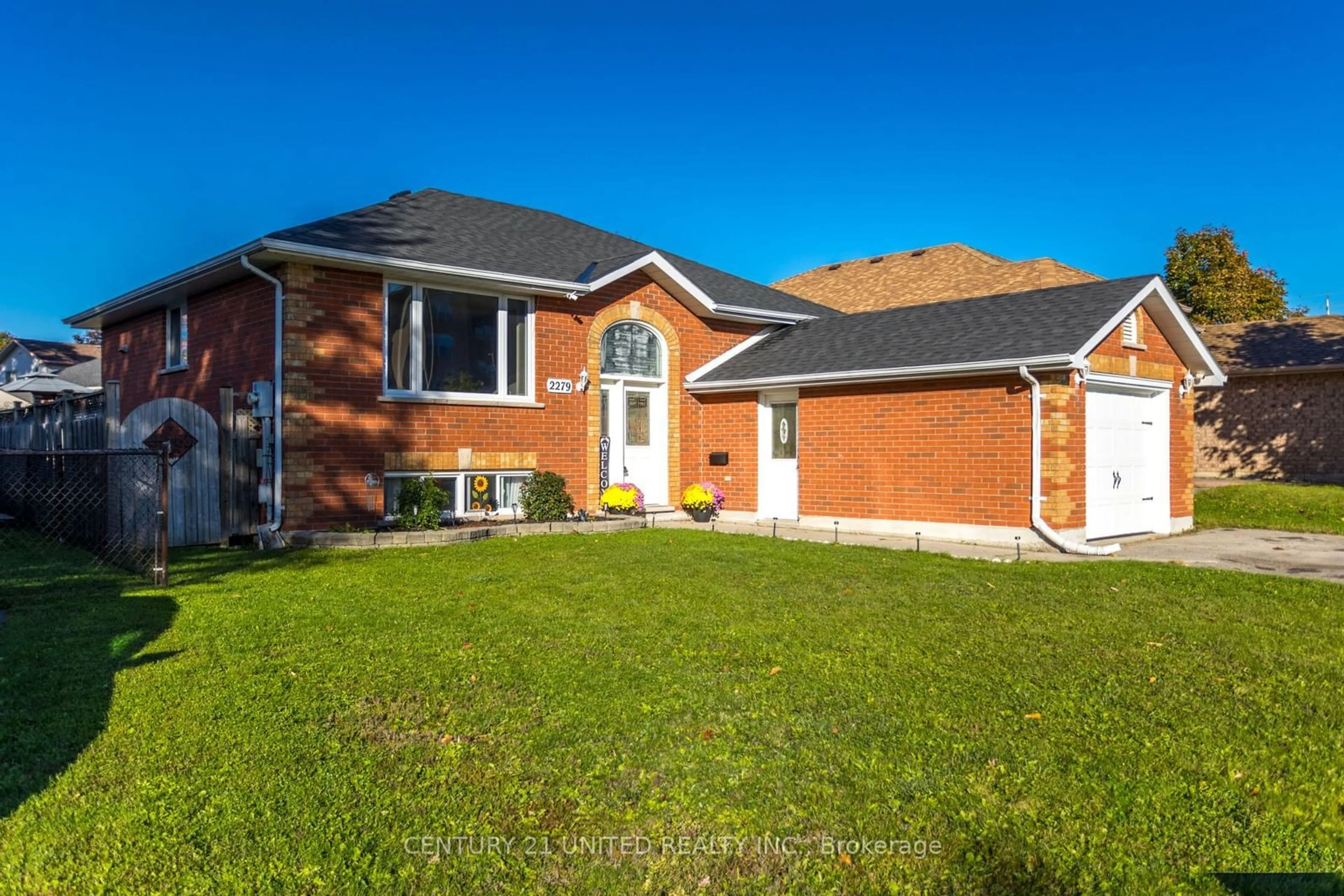 Frontside or backside of a home, the fenced backyard for 2279 Denure Dr, Peterborough Ontario K9K 2G3