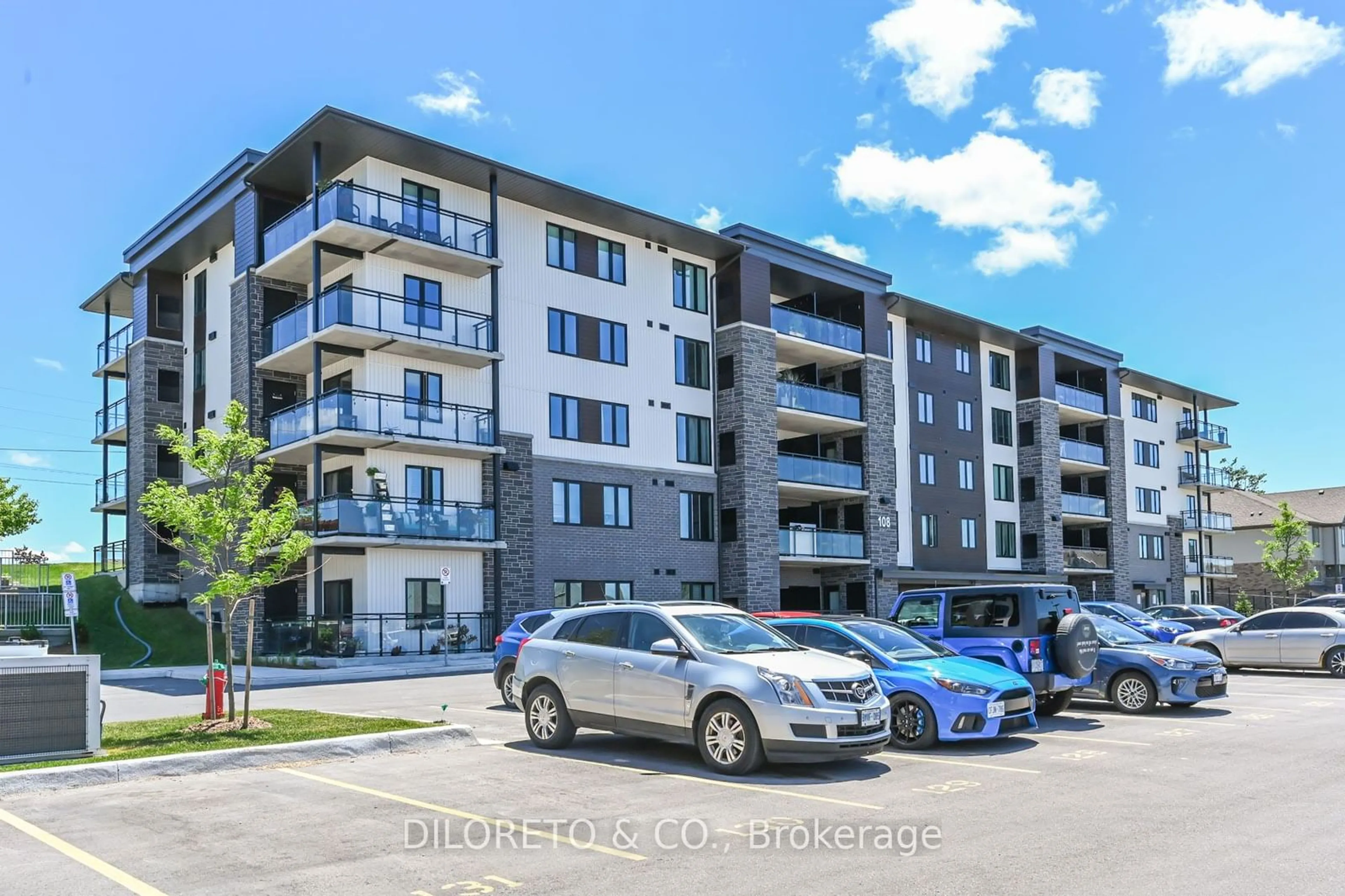 A pic from exterior of the house or condo, the street view for 108 Summit Ridge Dr #409, Guelph Ontario N1E 0P8