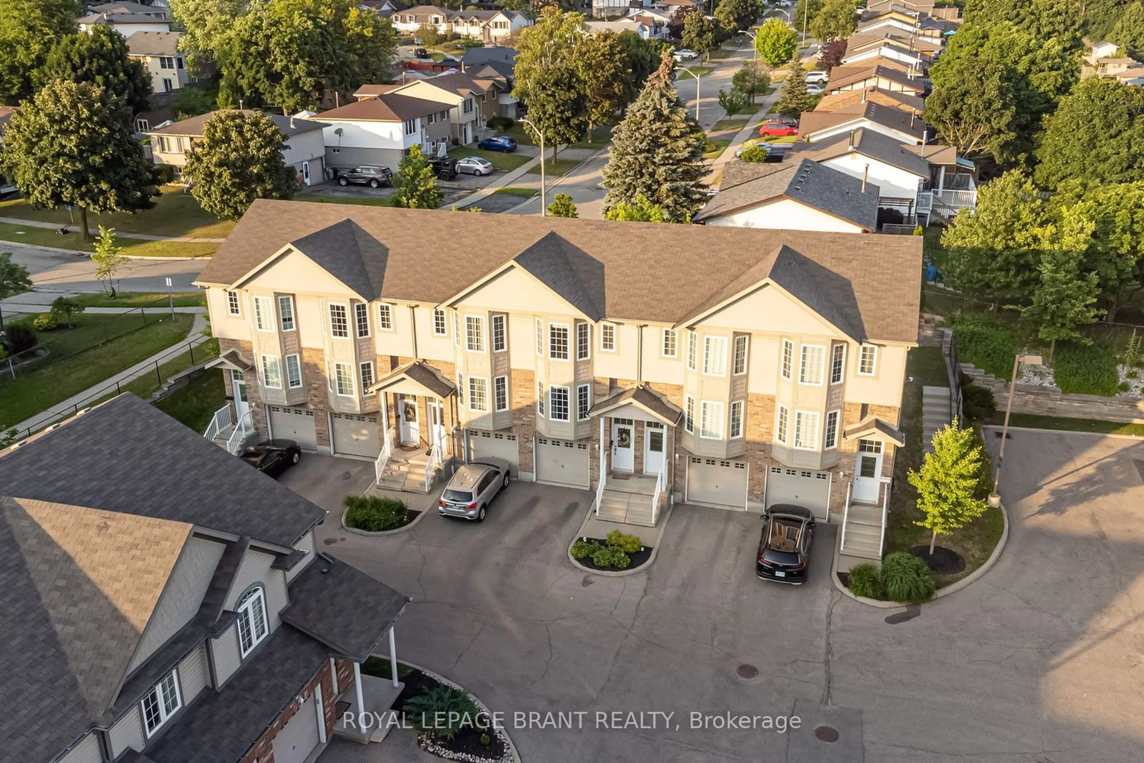 A pic from exterior of the house or condo, the street view for 975 Strasburg Rd #12, Kitchener Ontario N2E 0A8