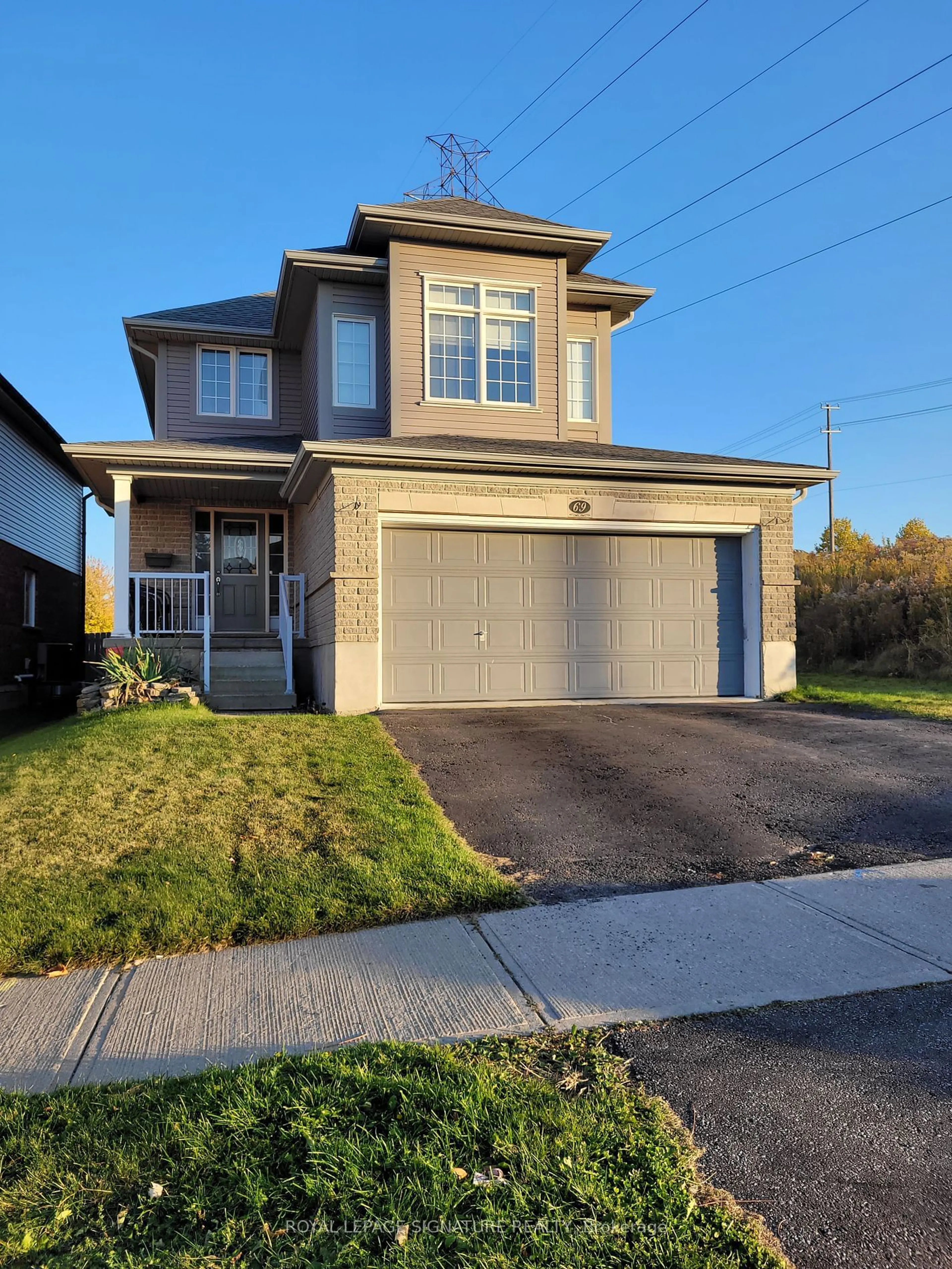 Frontside or backside of a home, the street view for 69 Banffshire St, Kitchener Ontario N2R 1W2