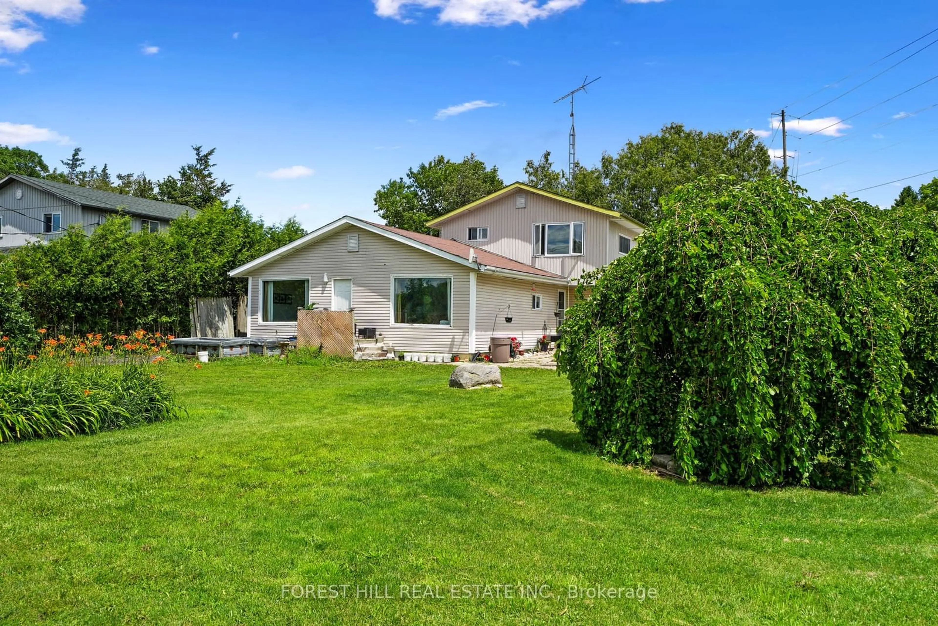 Frontside or backside of a home, the fenced backyard for 1686 8th Line, Trent Hills Ontario K0L 1L0