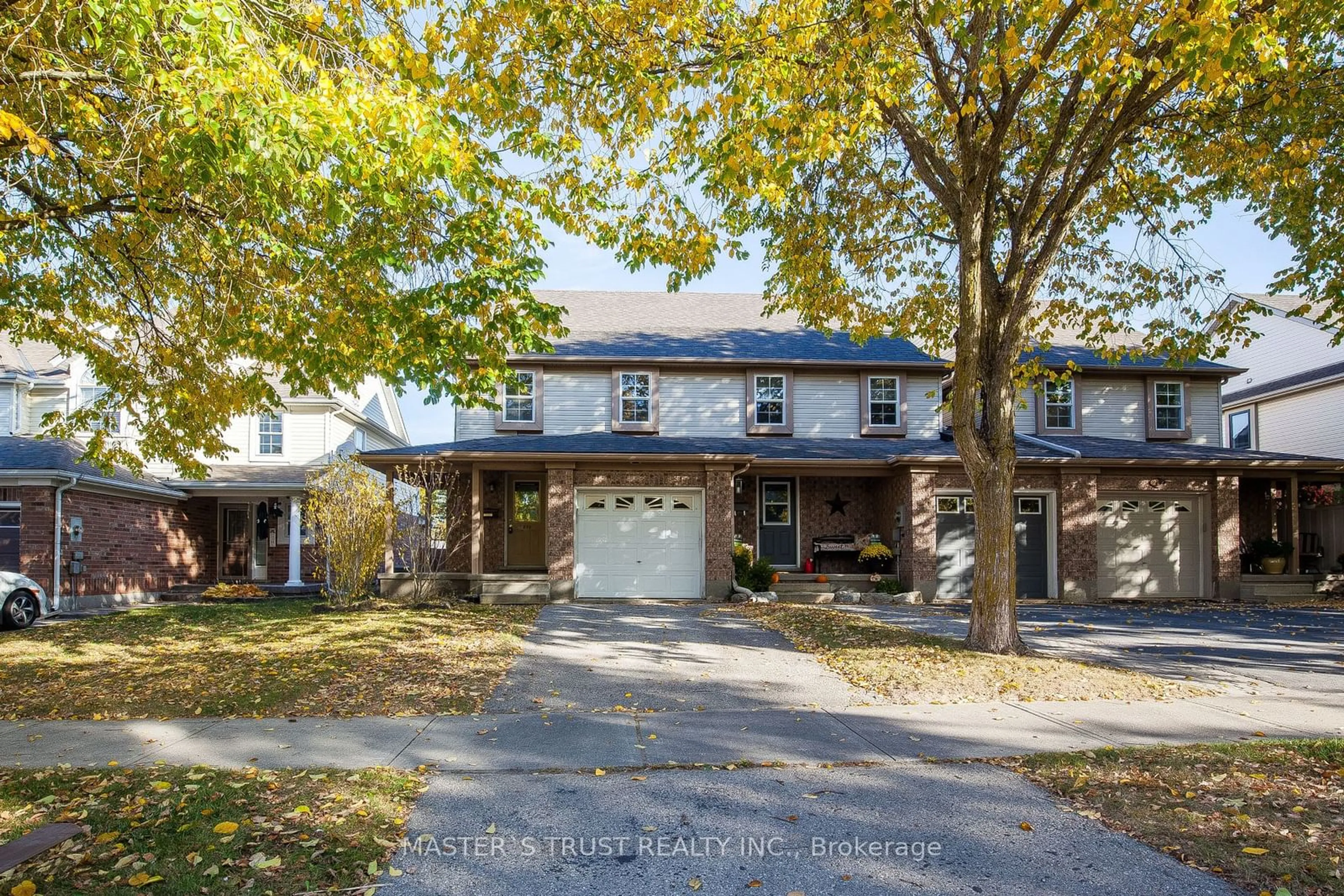 A pic from exterior of the house or condo, the street view for 233 Silurian Dr, Guelph Ontario N1E 7B8