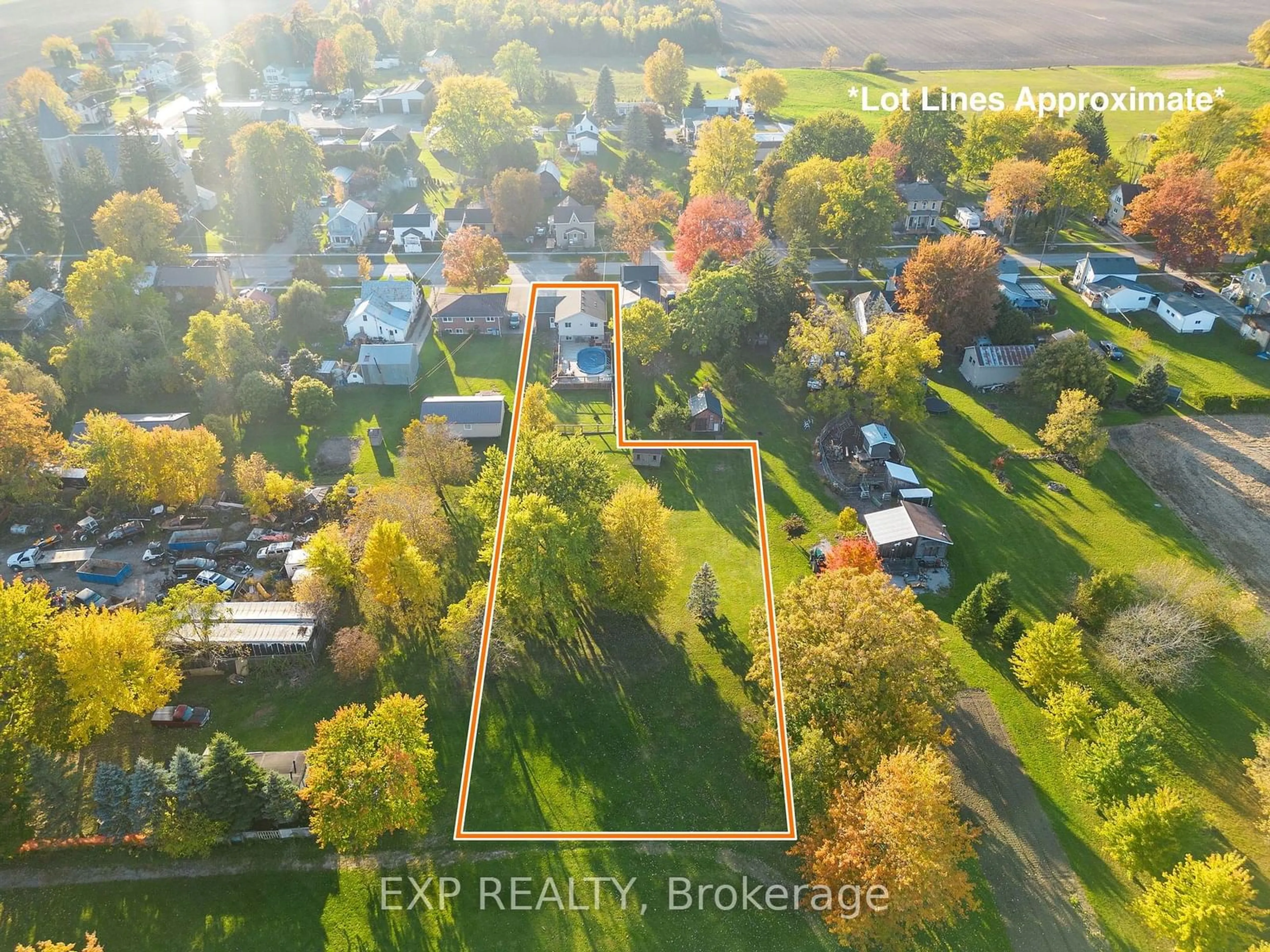 Frontside or backside of a home, the fenced backyard for 19 King St, South Huron Ontario N0M 1N0