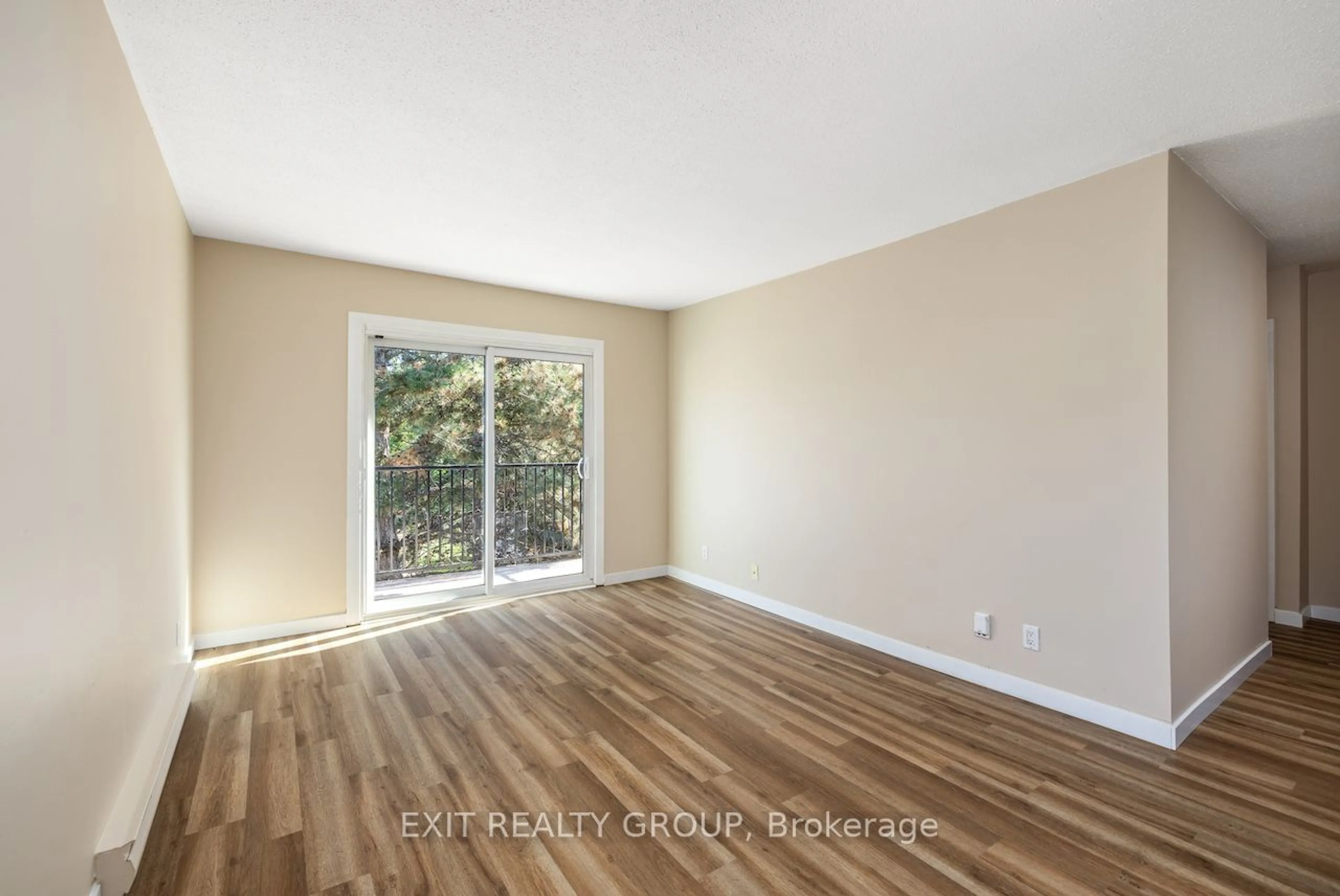 A pic of a room, wood floors for 25 College St #401, Belleville Ontario K8P 2E3