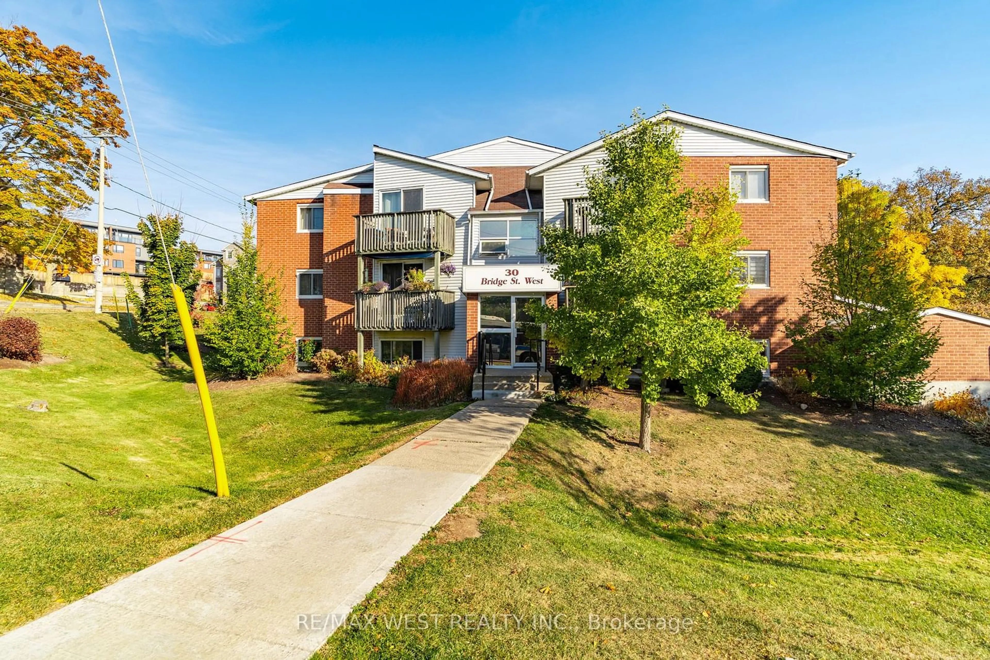 A pic from exterior of the house or condo, the front or back of building for 30 Bridge St #206, Kitchener Ontario N2K 1K4