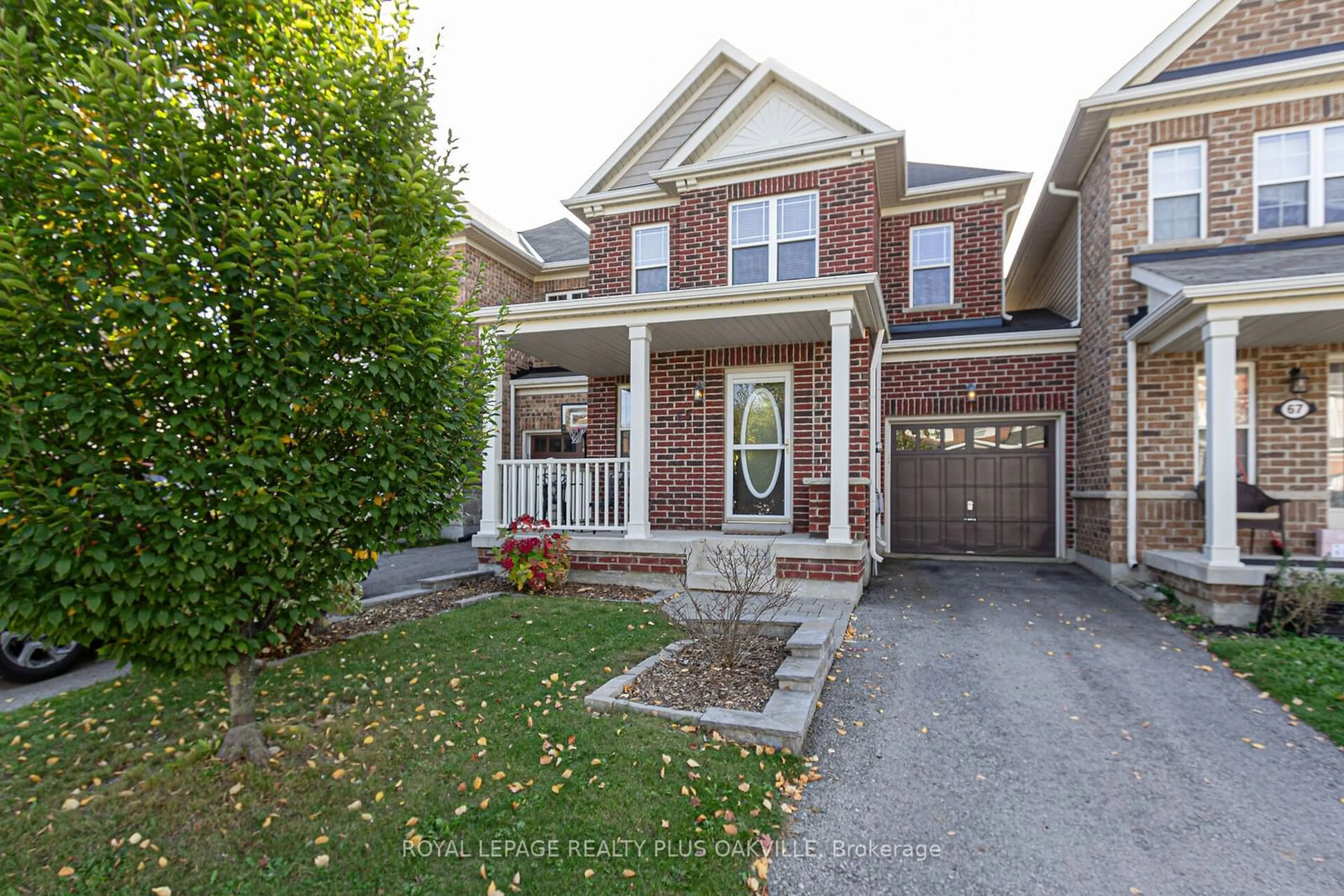 Frontside or backside of a home, the street view for 65 Lupo Dr, Hamilton Ontario L8B 0V3