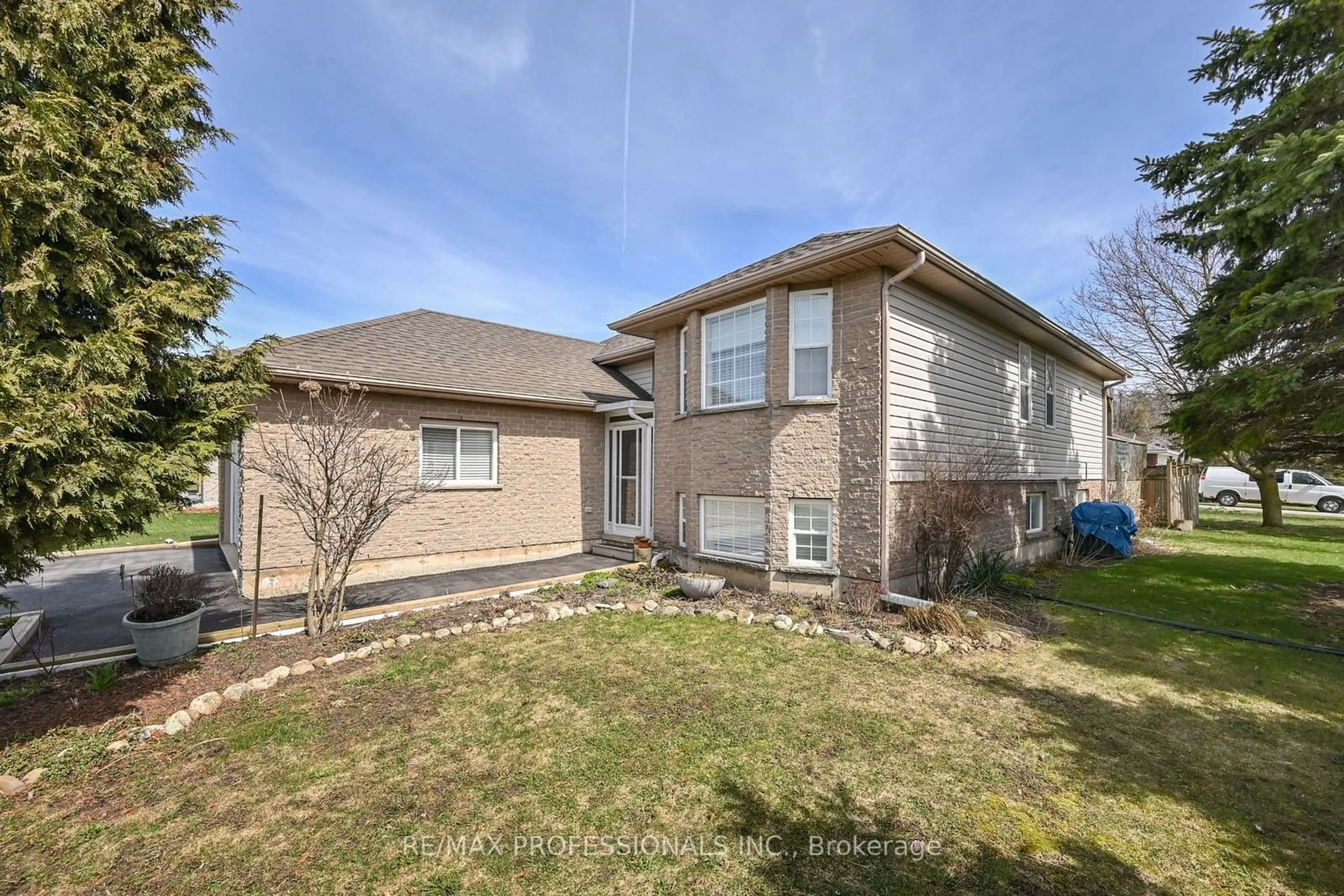 Frontside or backside of a home, the fenced backyard for 21 Highpoint St, Southgate Ontario N0C 1B0