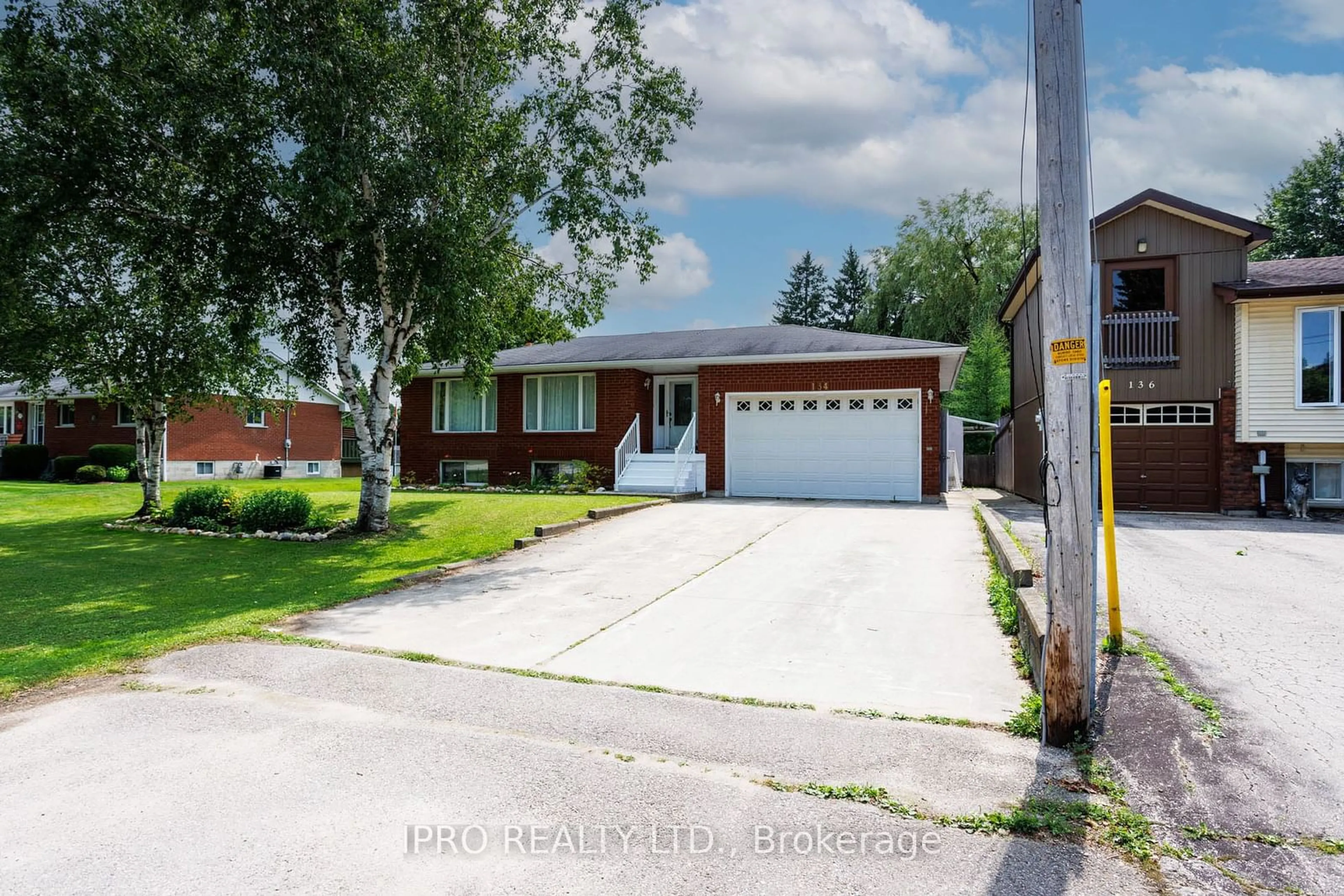 Frontside or backside of a home, the street view for 134 Osprey St, Southgate Ontario N0C 1B0