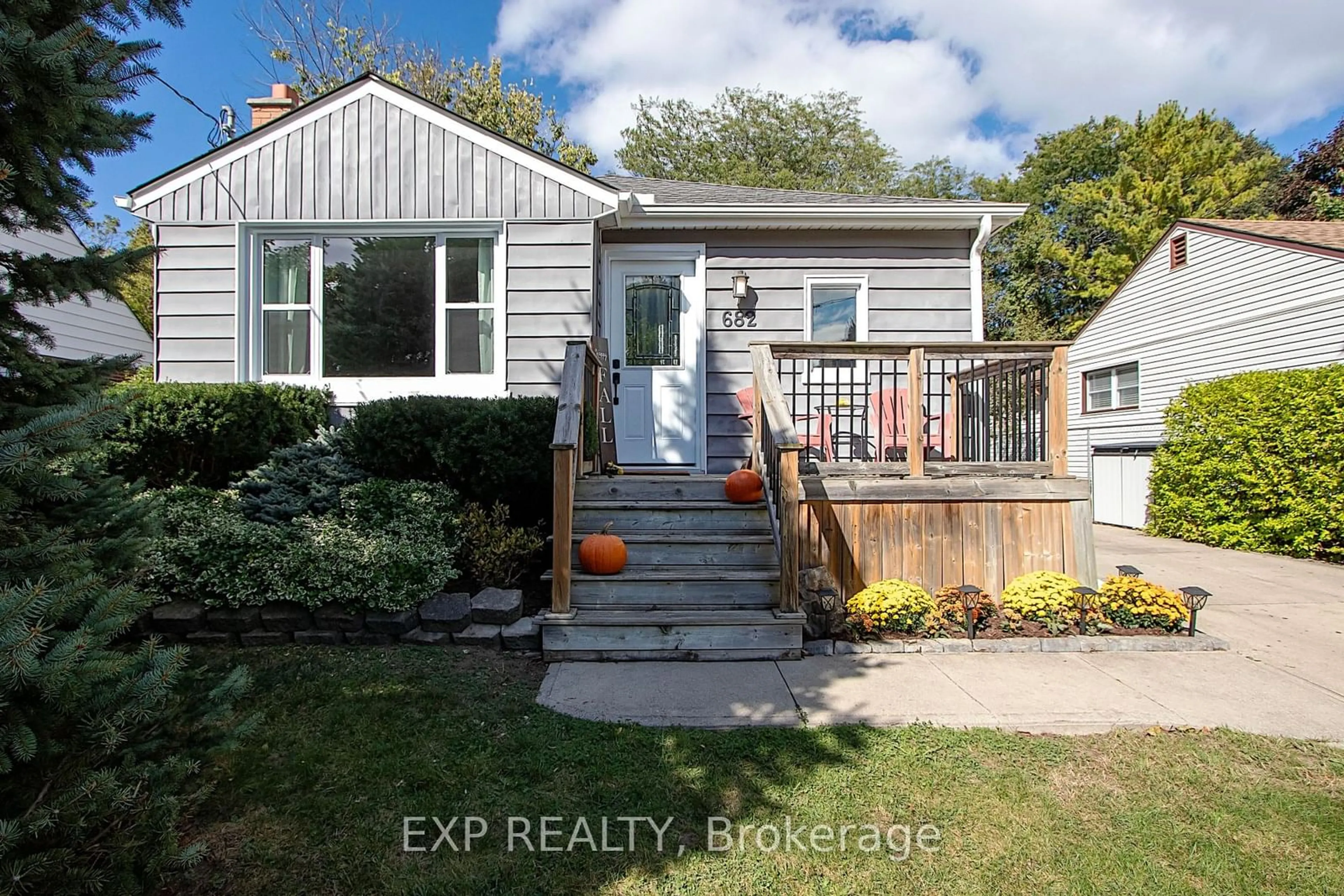 Frontside or backside of a home, the fenced backyard for 682 Ross St, London Ontario N5Y 3W1