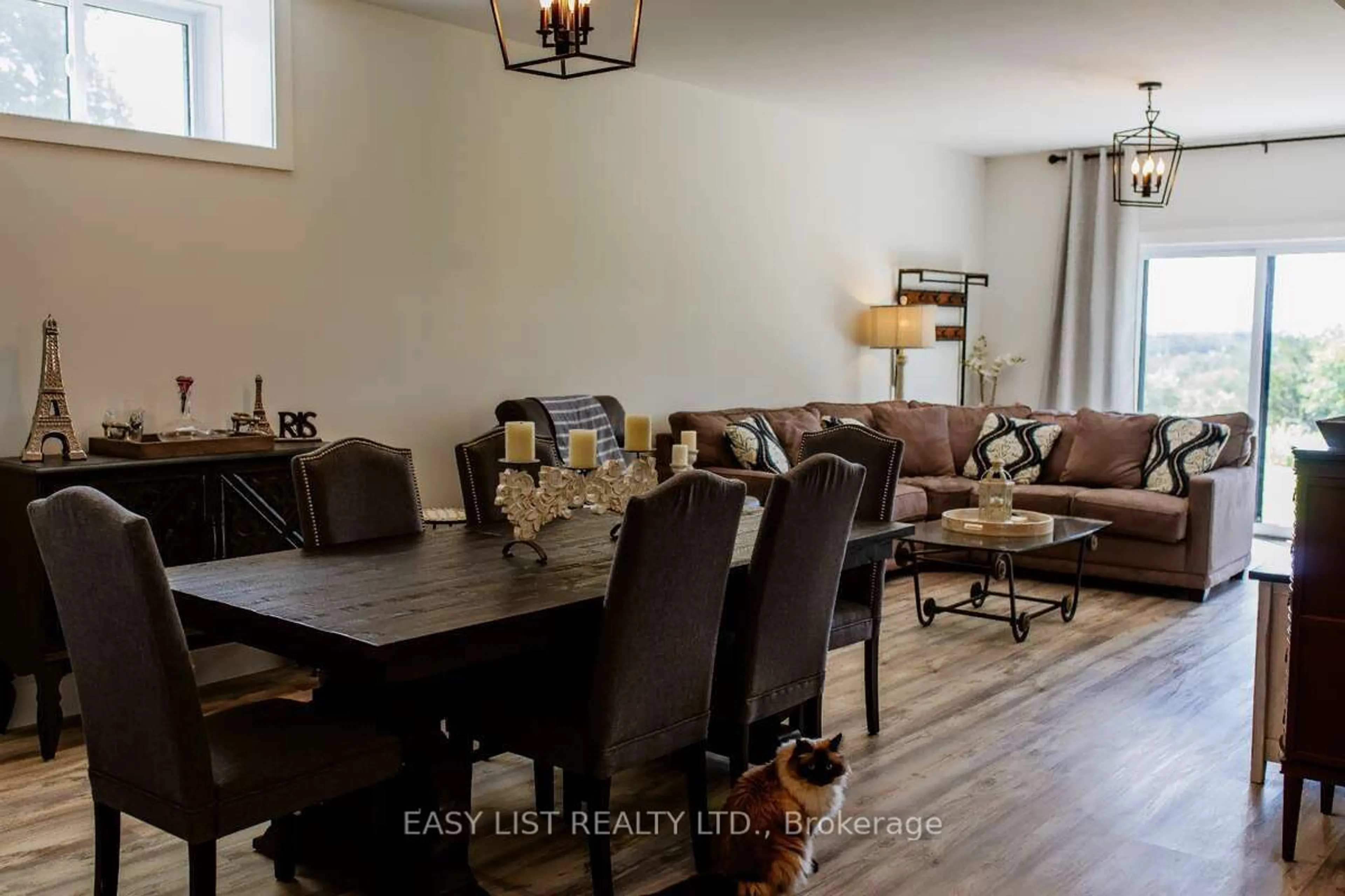 Dining room, wood/laminate floor for 1983 Grimshaw Rd, Cobourg Ontario K9A 4J8