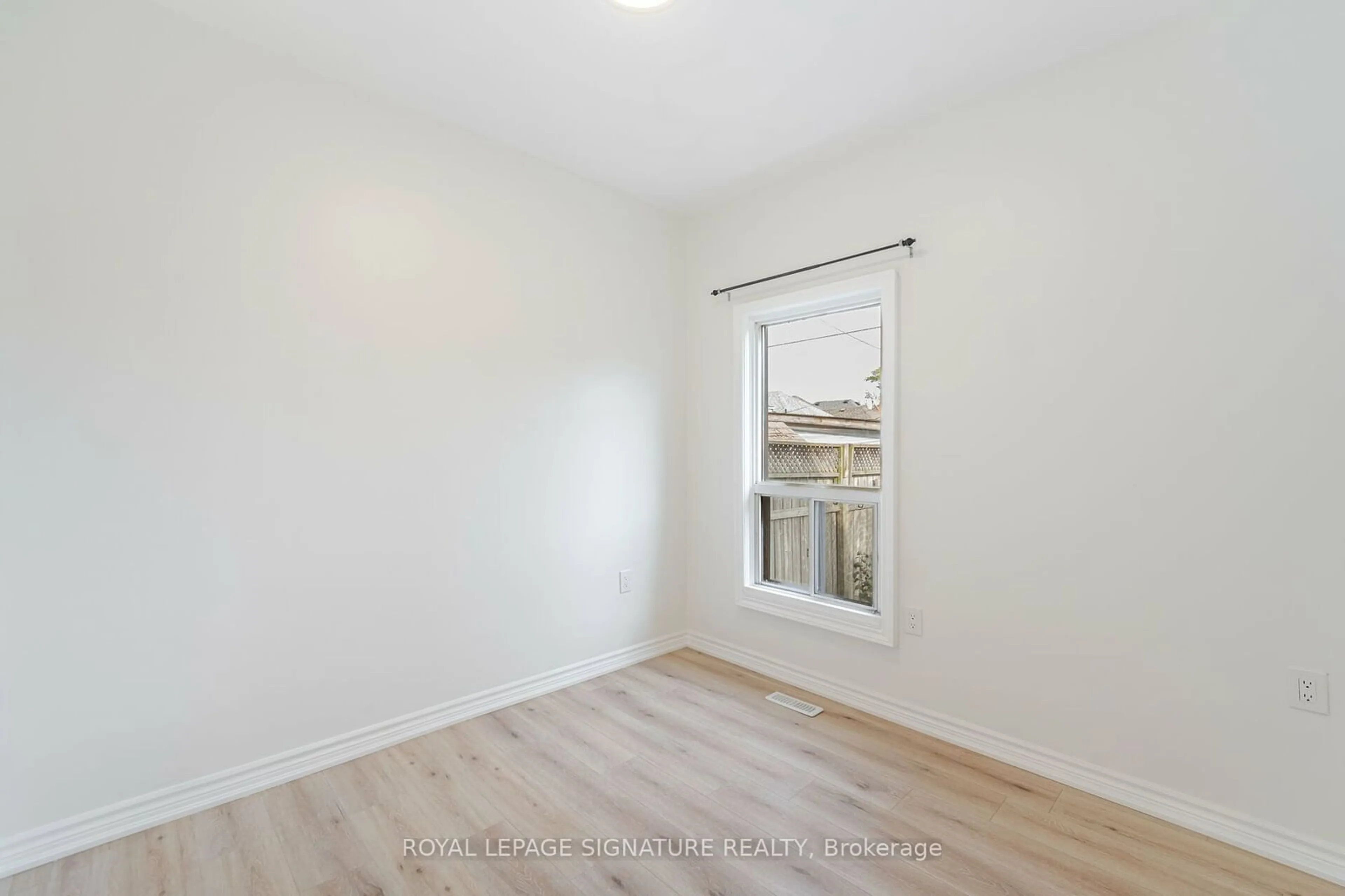 A pic of a room, wood floors for 35 Britannia Ave, Hamilton Ontario L8H 1W5