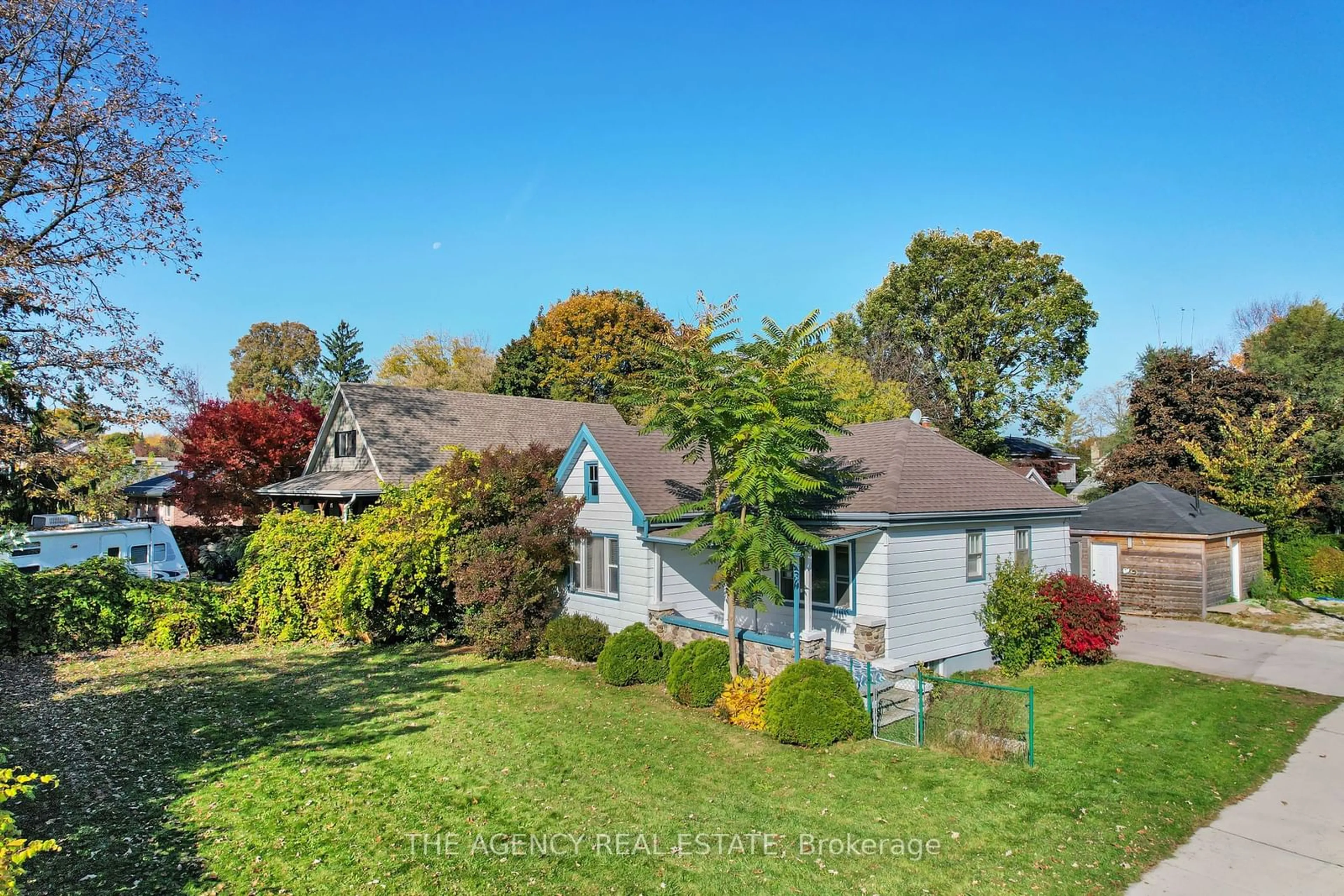 Frontside or backside of a home, the fenced backyard for 66 Langarth St, London Ontario N6J 1P4