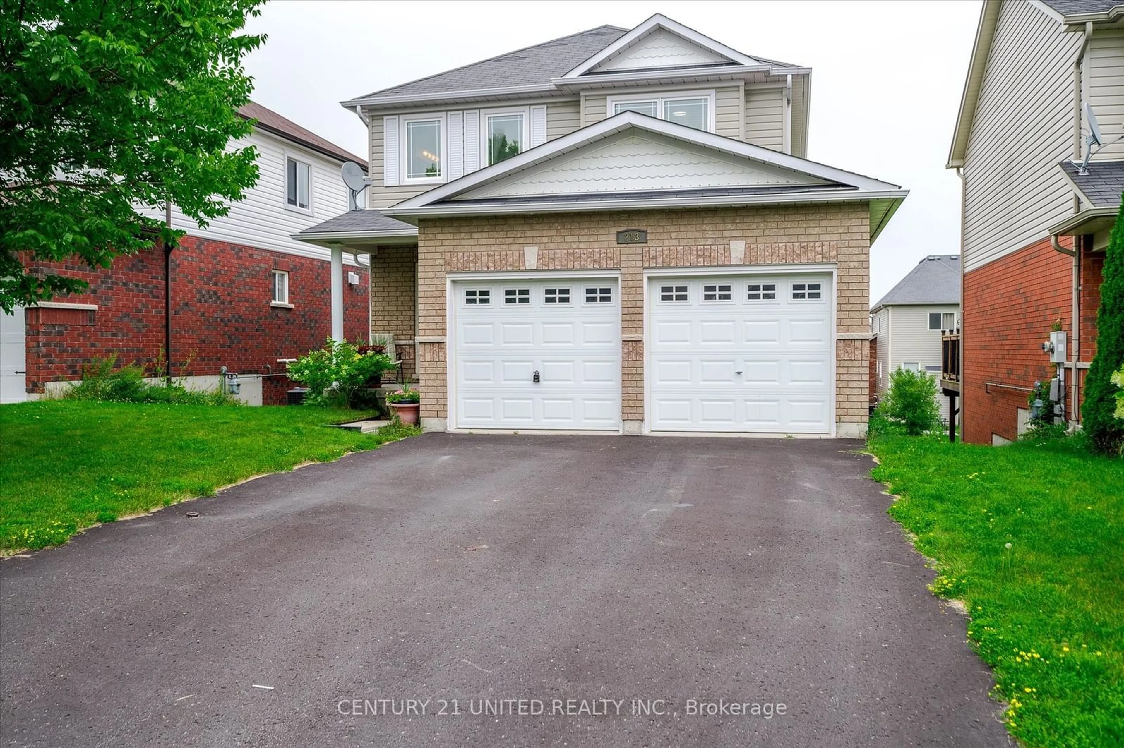 Frontside or backside of a home, cottage for 213 Farrier Cres, Peterborough Ontario K9L 0A6