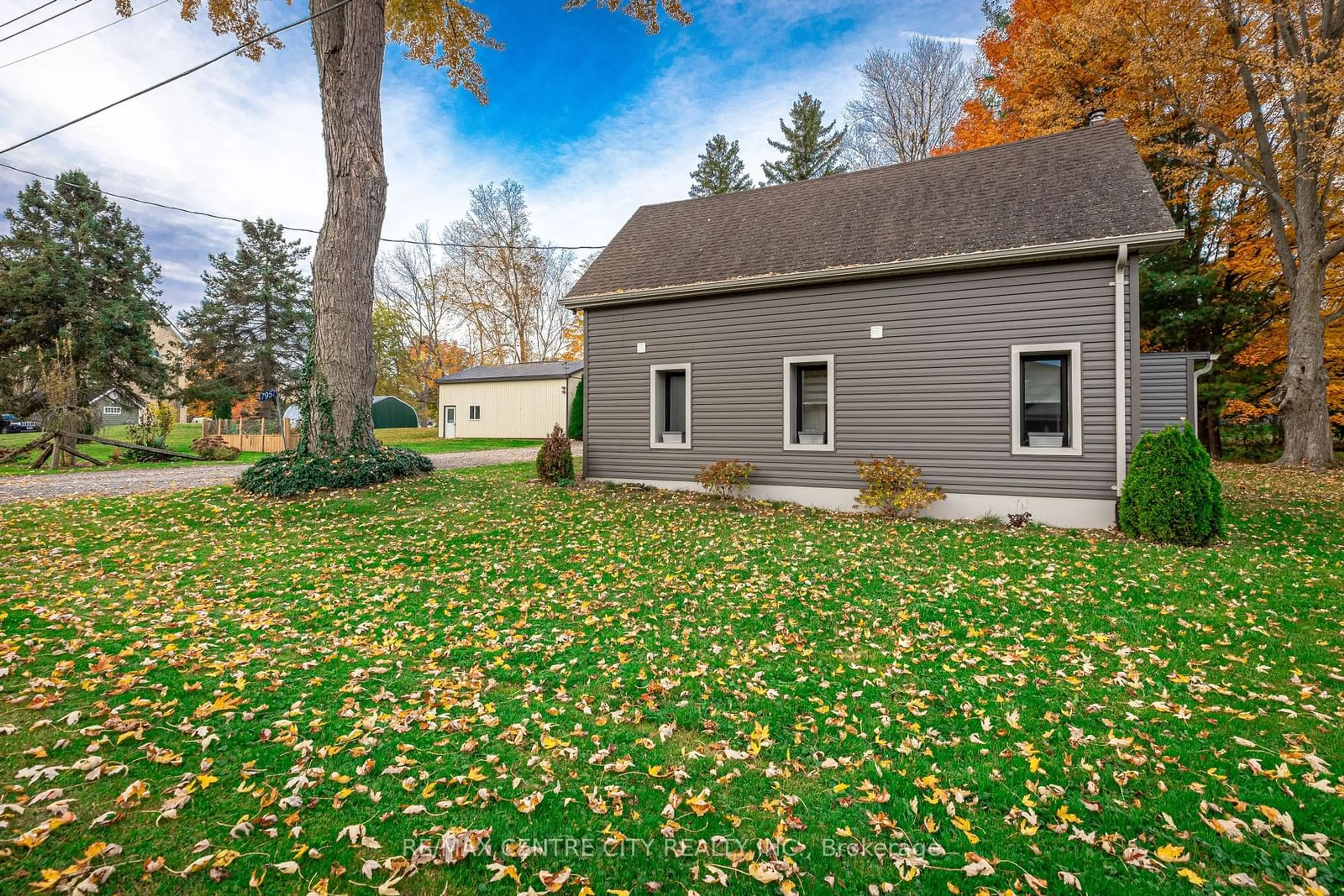 A pic from exterior of the house or condo, the fenced backyard for 7957 Argyle St, Southwold Ontario N0L 1K0