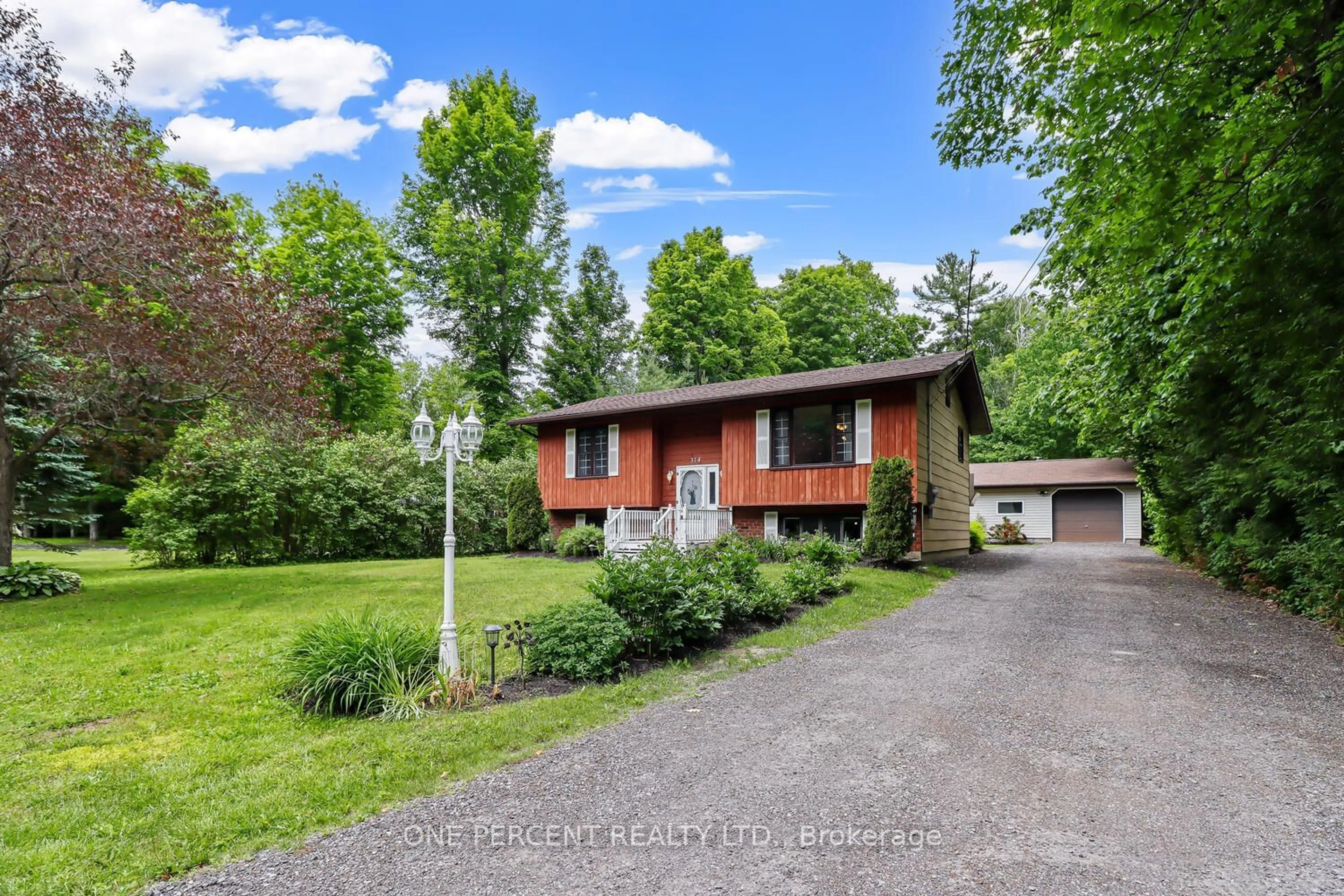 Frontside or backside of a home, cottage for 314 Riverside Dr, Kawartha Lakes Ontario K0M 1A0