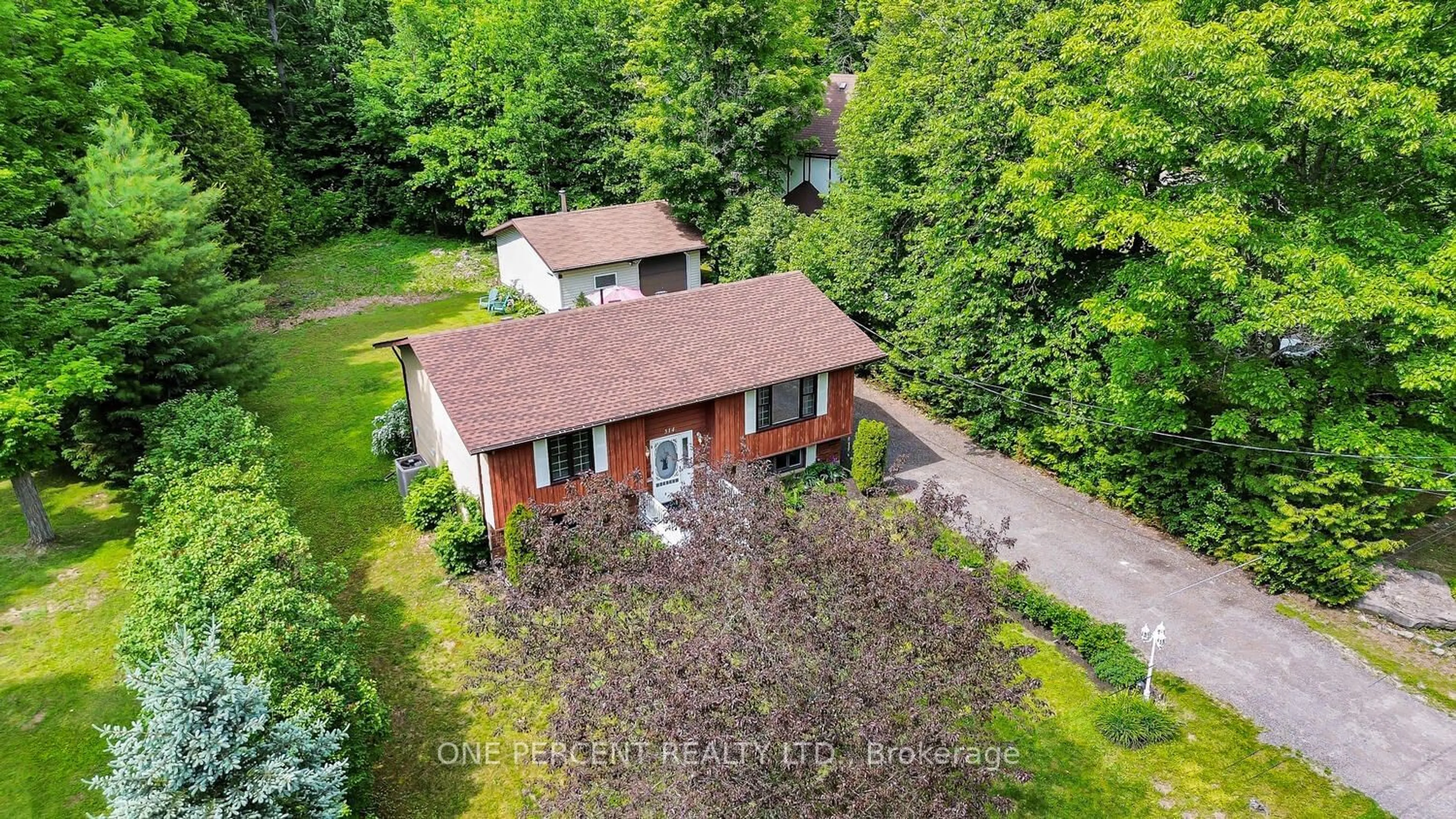 Frontside or backside of a home, cottage for 314 Riverside Dr, Kawartha Lakes Ontario K0M 1A0