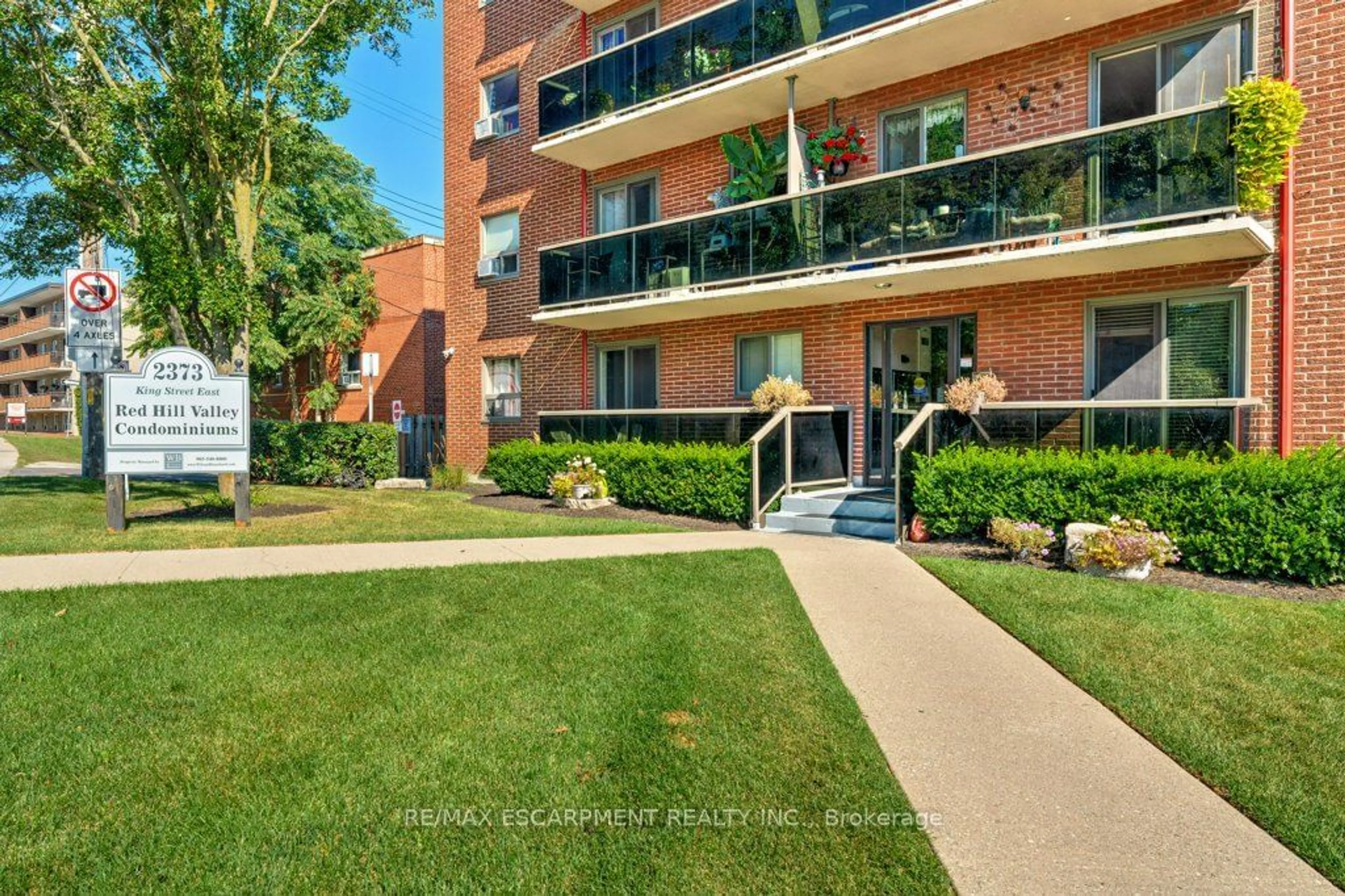 A pic from exterior of the house or condo, the street view for 2373 King St #17, Hamilton Ontario L8K 1X9