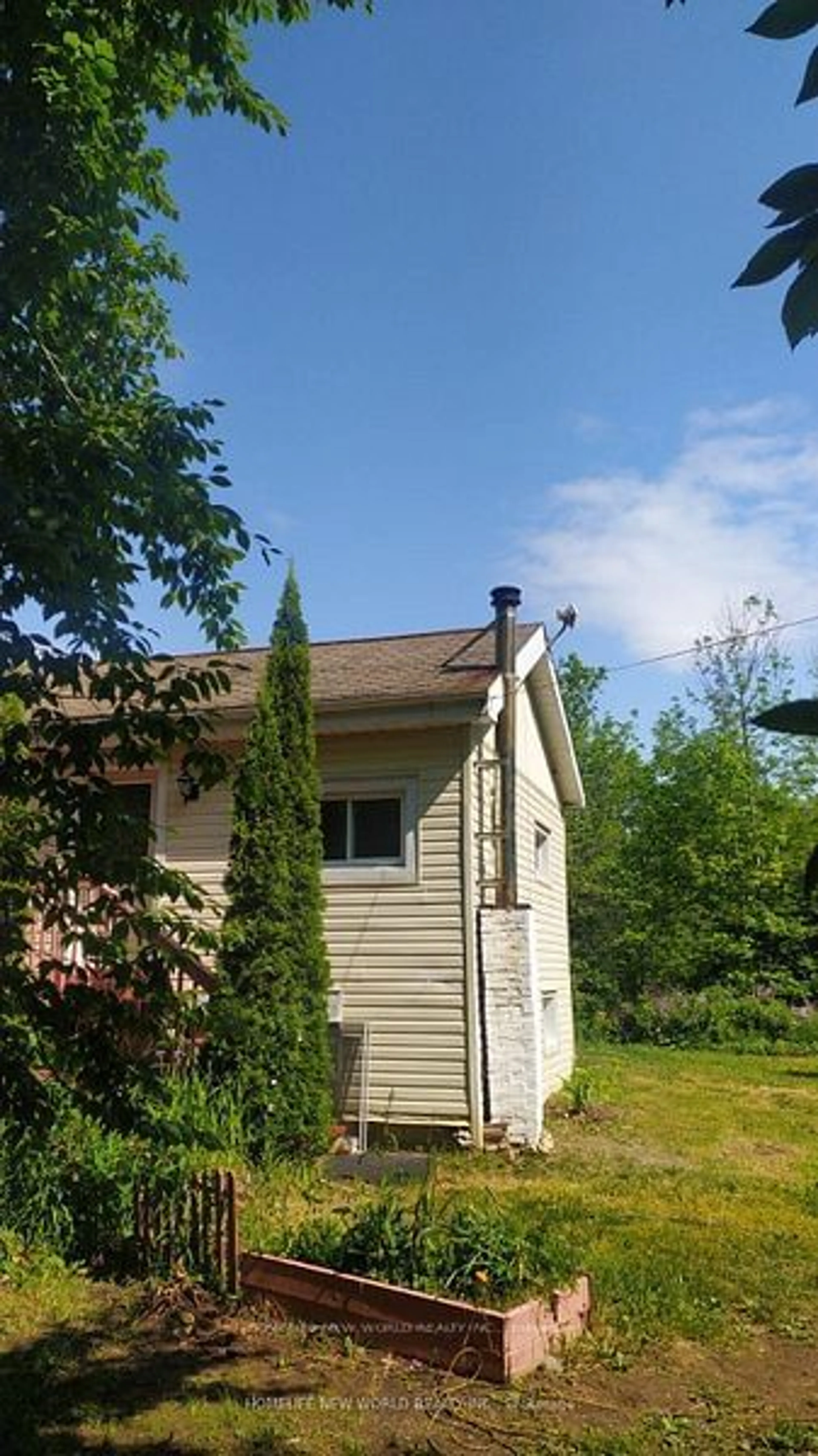 Frontside or backside of a home, cottage for 242033 Concession Road 3 Rd, Georgian Bluffs Ontario N0H 2K0