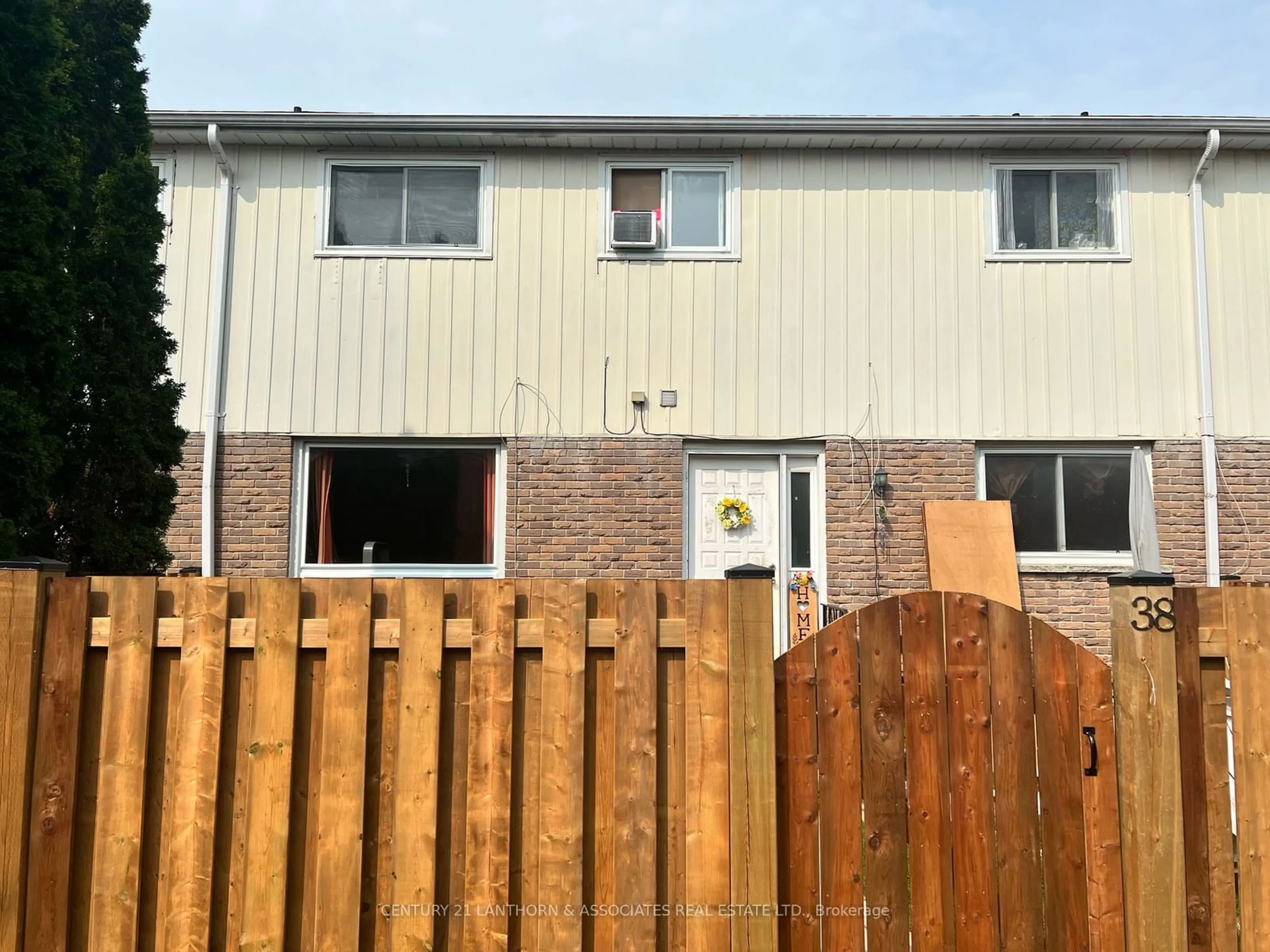 A pic from exterior of the house or condo, the fenced backyard for 19 Tracey Park Dr #38, Belleville Ontario K8P 4R4