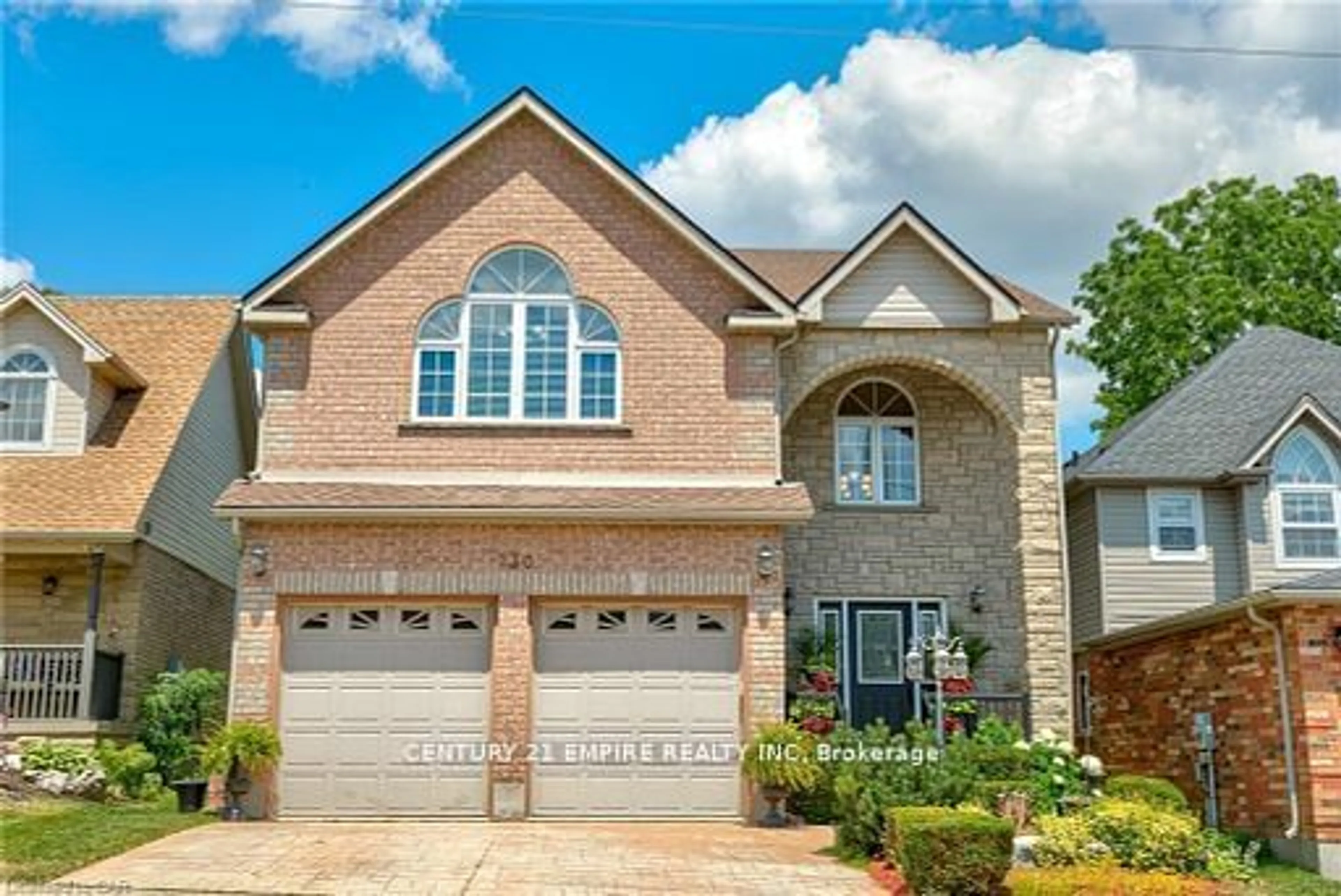 Home with brick exterior material for 230 Doon Mills Dr, Kitchener Ontario N2P 2R8