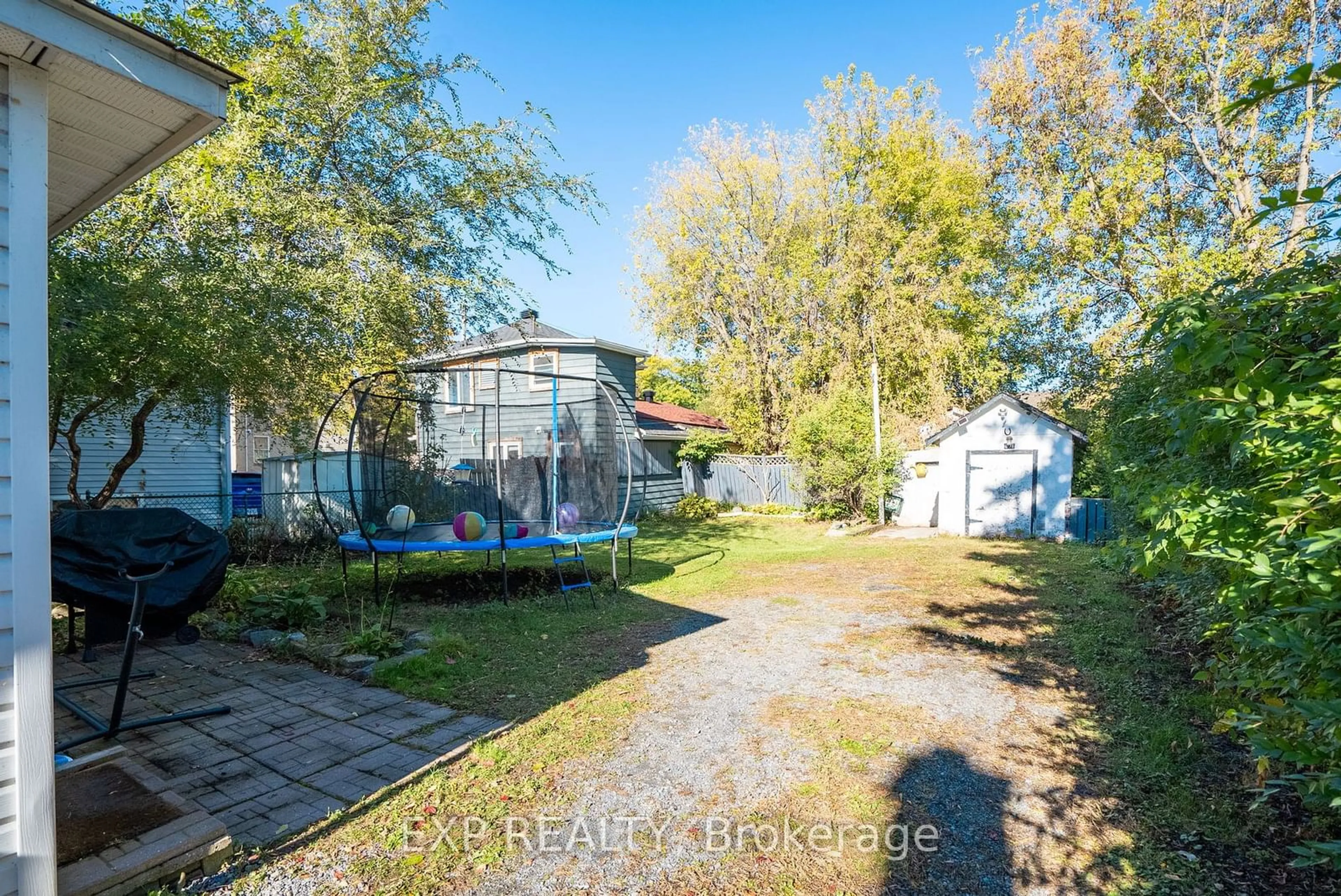 Frontside or backside of a home, the fenced backyard for 231 Water St, Cornwall Ontario K6J 1A4