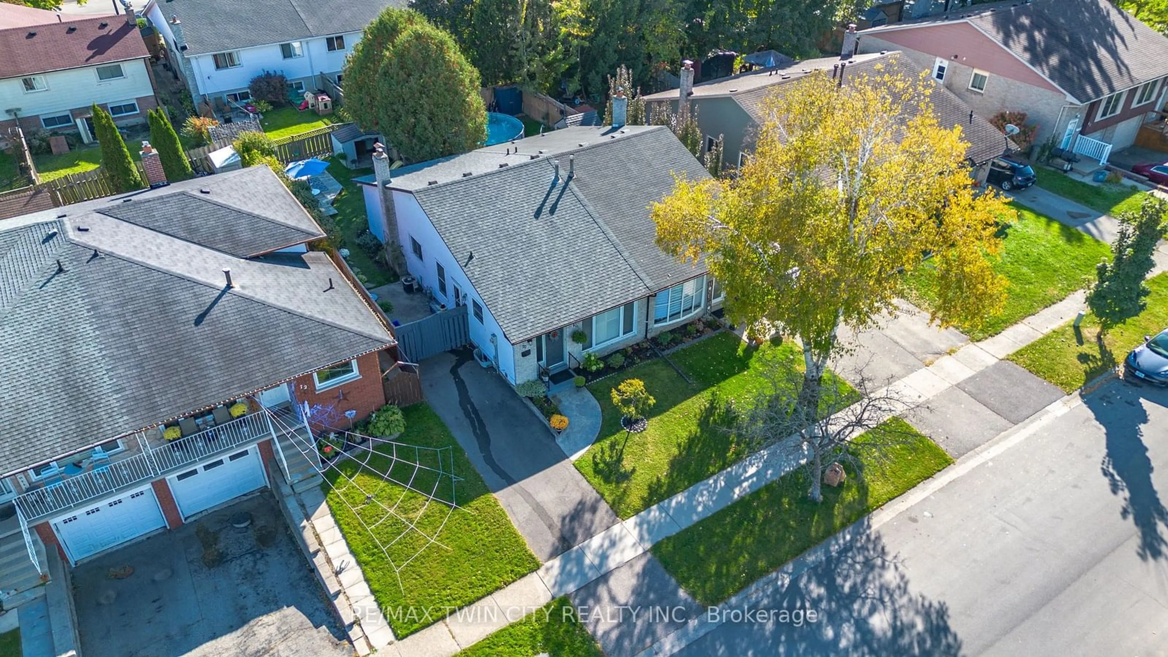 Frontside or backside of a home, the fenced backyard for 70 Four Seasons Dr, Brant Ontario N3R 7B3