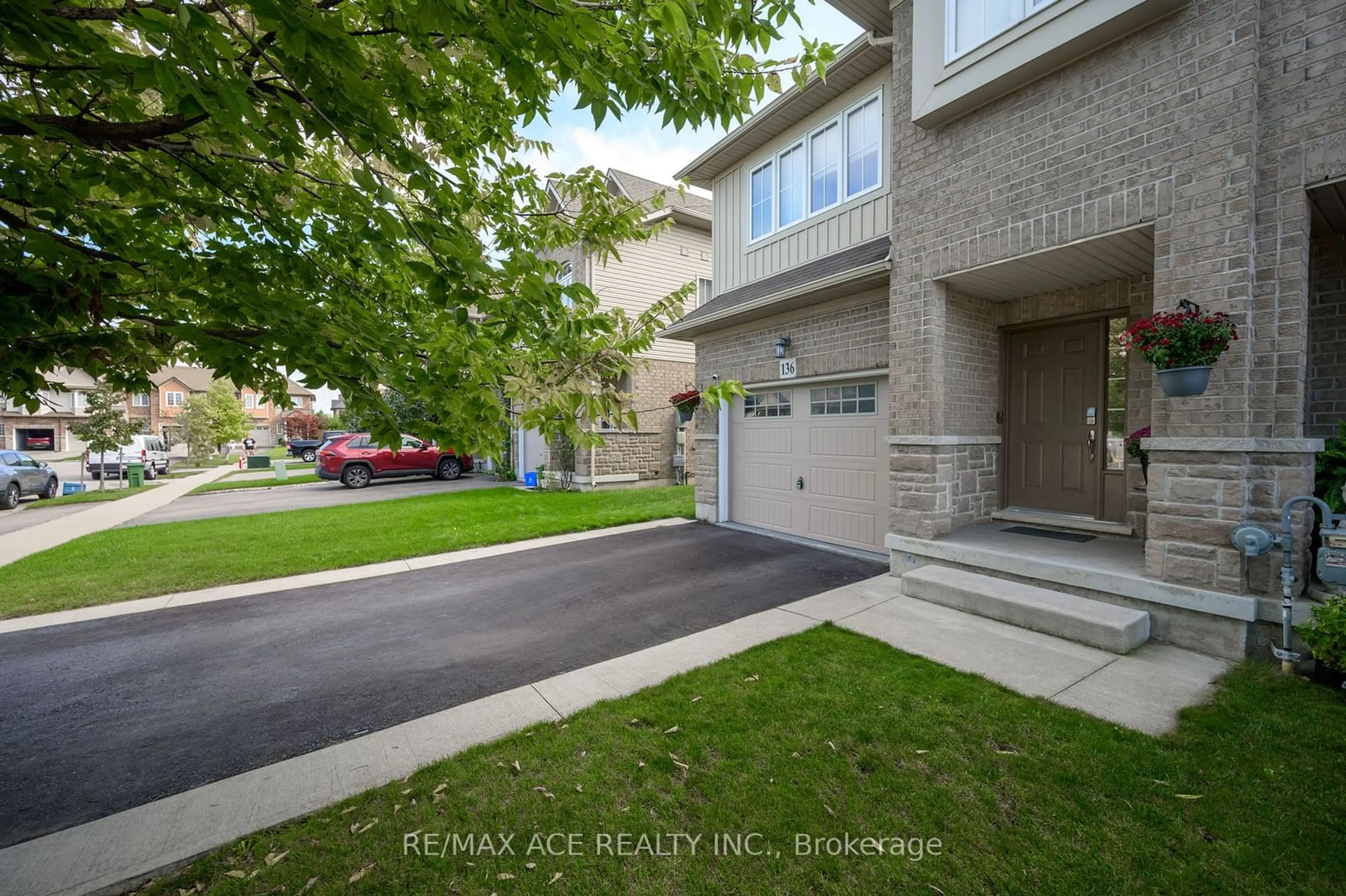 A pic from exterior of the house or condo, the street view for 136 Palacebeach Tr, Hamilton Ontario L8E 0C3