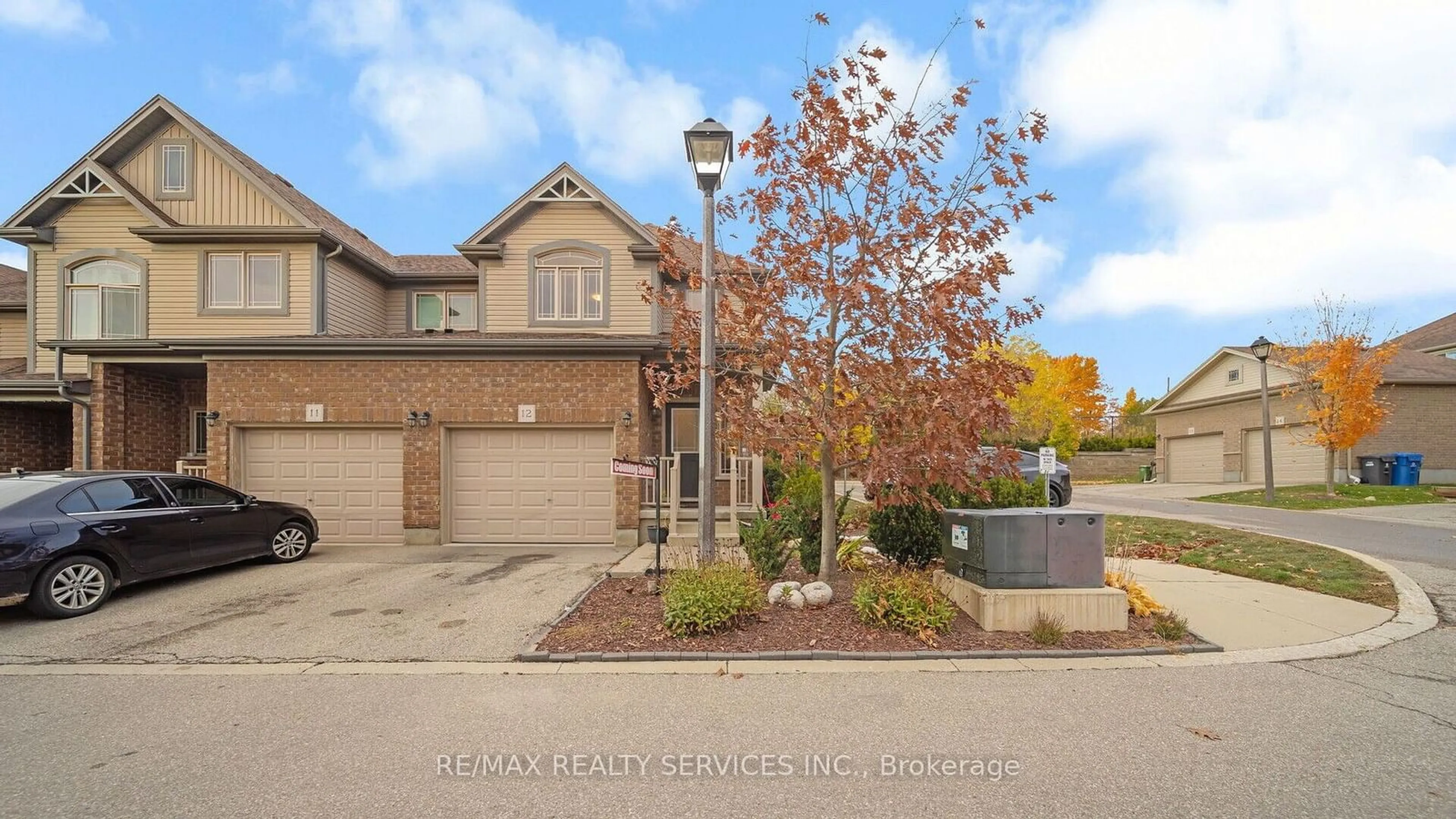 A pic from exterior of the house or condo, the street view for 14 Amos Dr #12, Guelph Ontario N1L 0M2