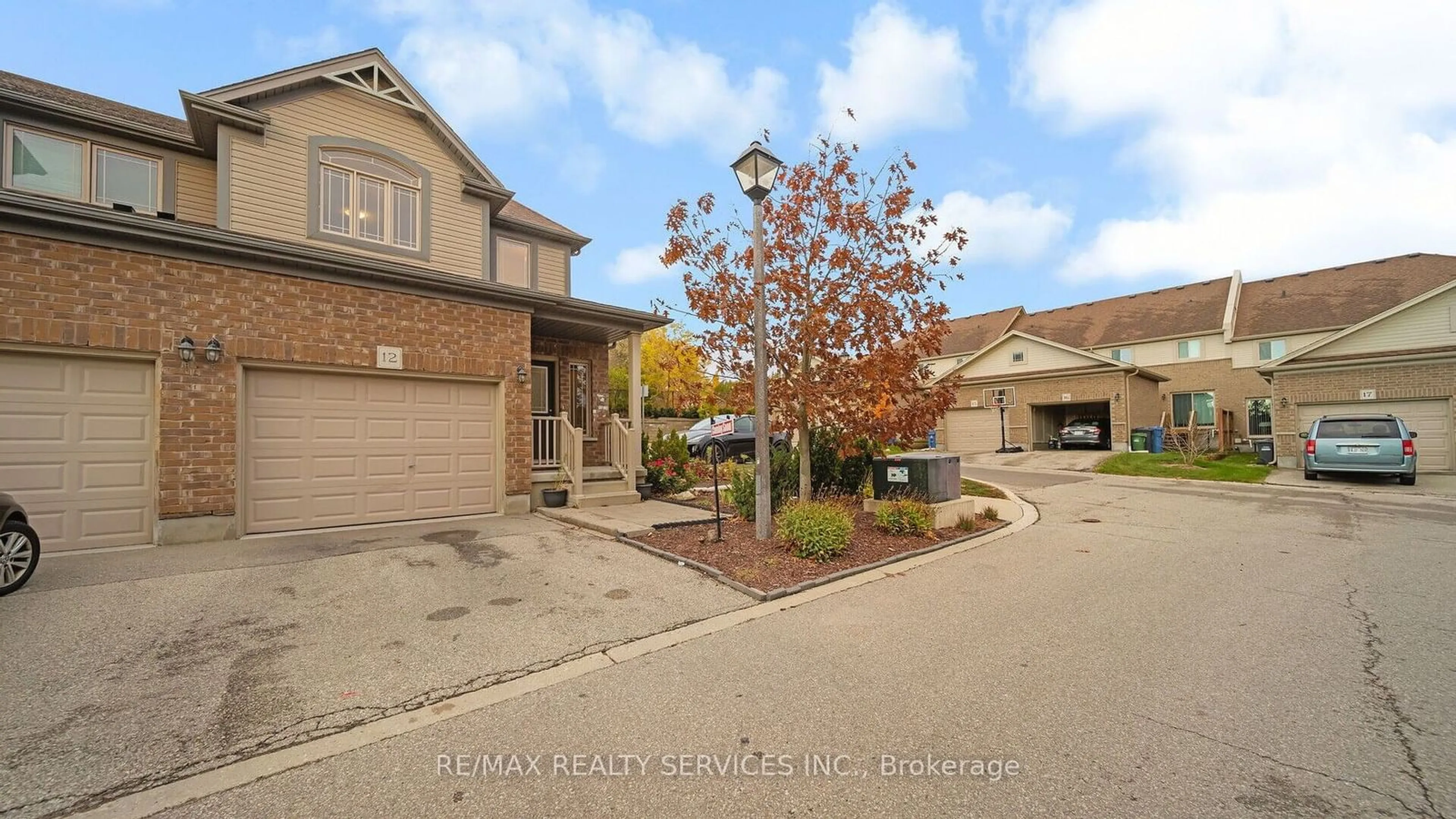 A pic from exterior of the house or condo, the street view for 14 Amos Dr #12, Guelph Ontario N1L 0M2