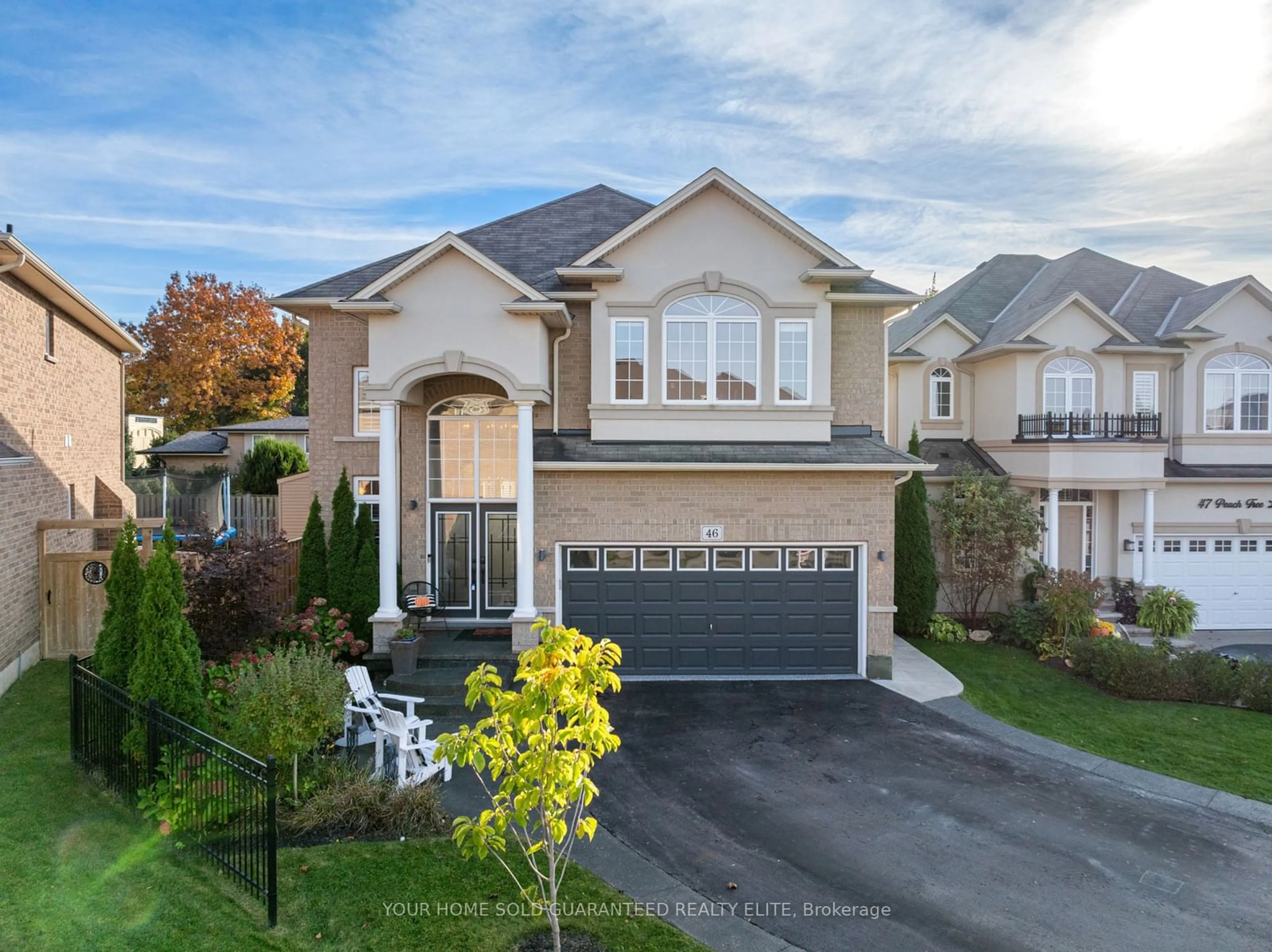 Frontside or backside of a home, the street view for 46 Peach Tree Lane, Grimsby Ontario L3M 0C1