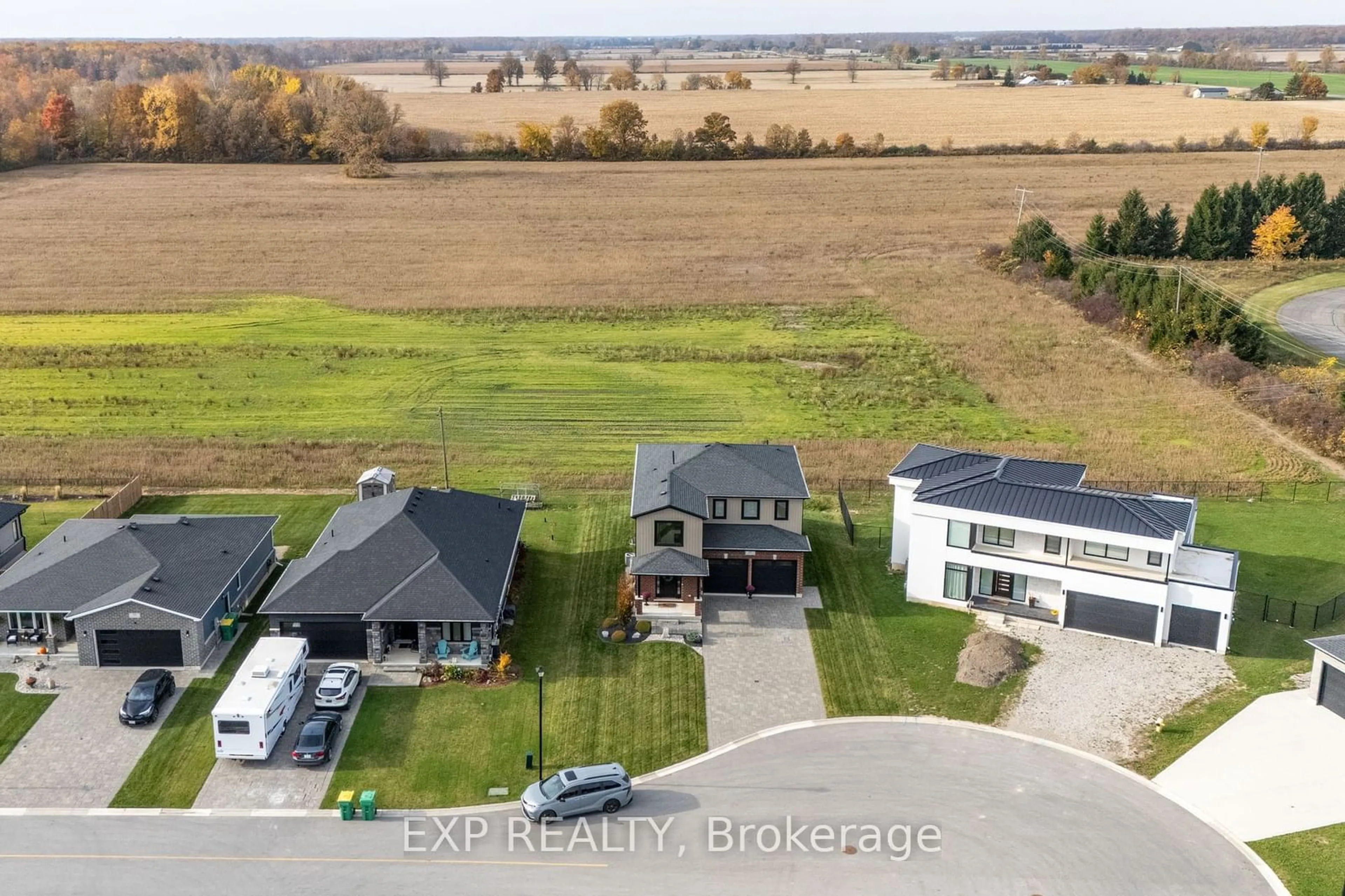 Frontside or backside of a home, the fenced backyard for 67 Tanya Dr, Southwest Middlesex Ontario N0L 1M0