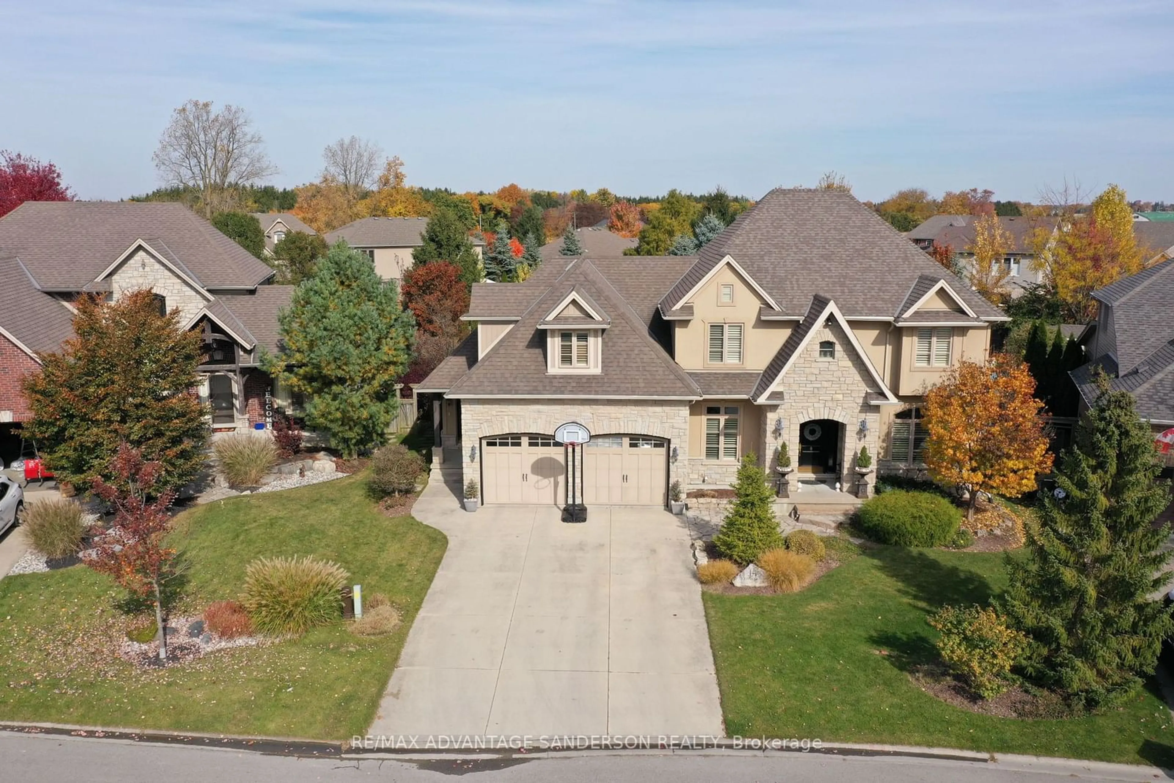 Frontside or backside of a home, the street view for 14 Dogwood Tr, Middlesex Centre Ontario N0M 2A0