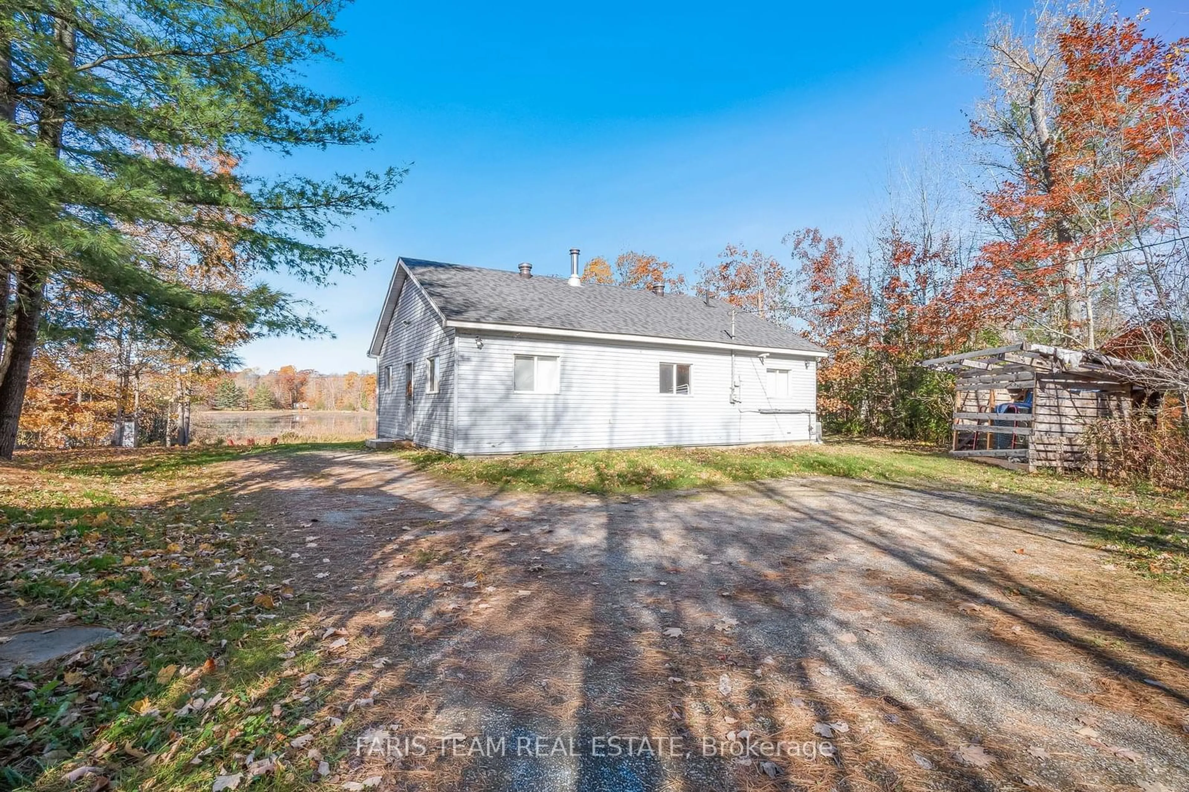 A pic from exterior of the house or condo, the fenced backyard for 380 Corrievale Rd, Georgian Bay Ontario L0K 1S0