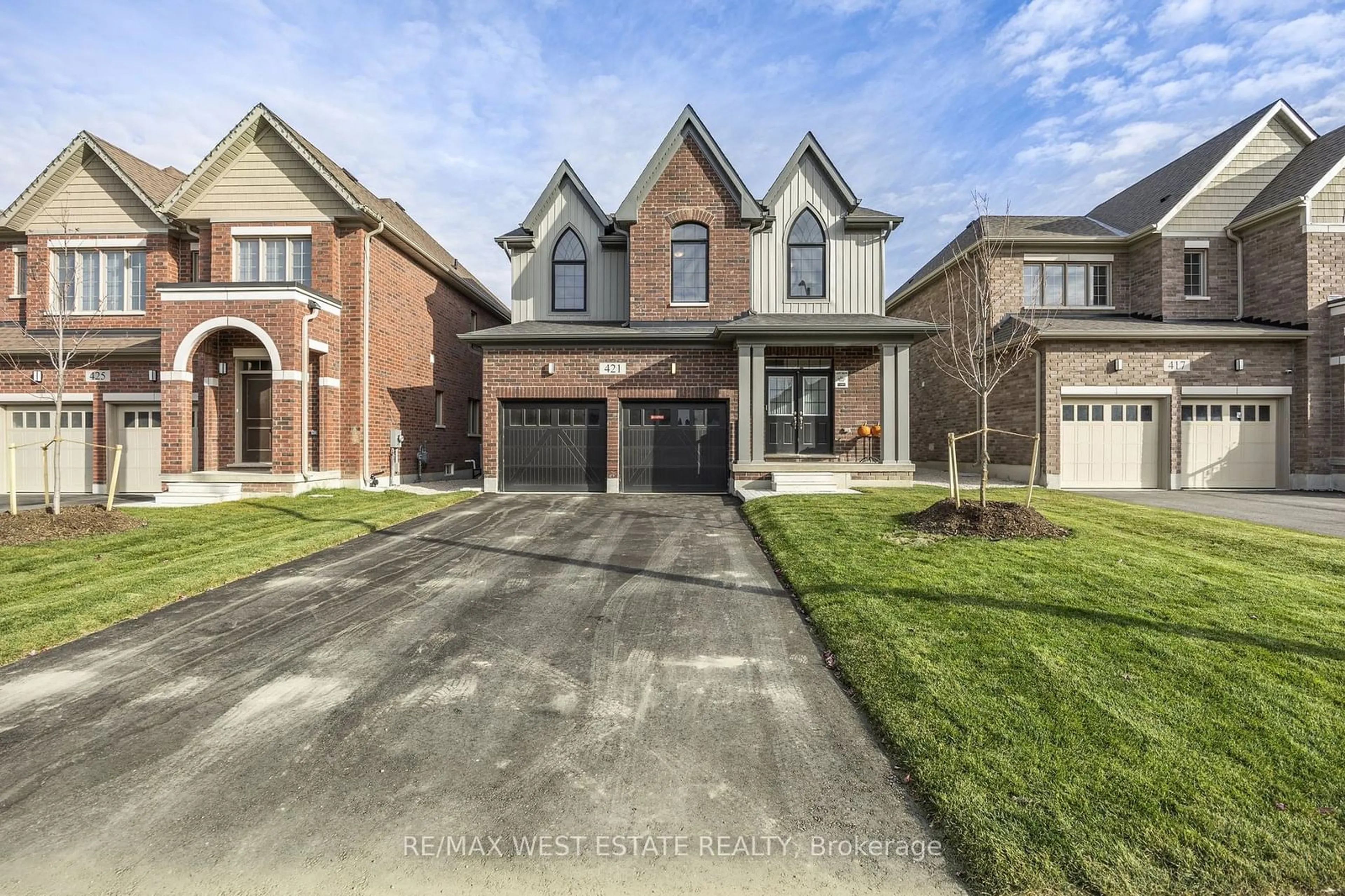 Home with brick exterior material for 421 Adelaide St, Wellington North Ontario N0G 1A0