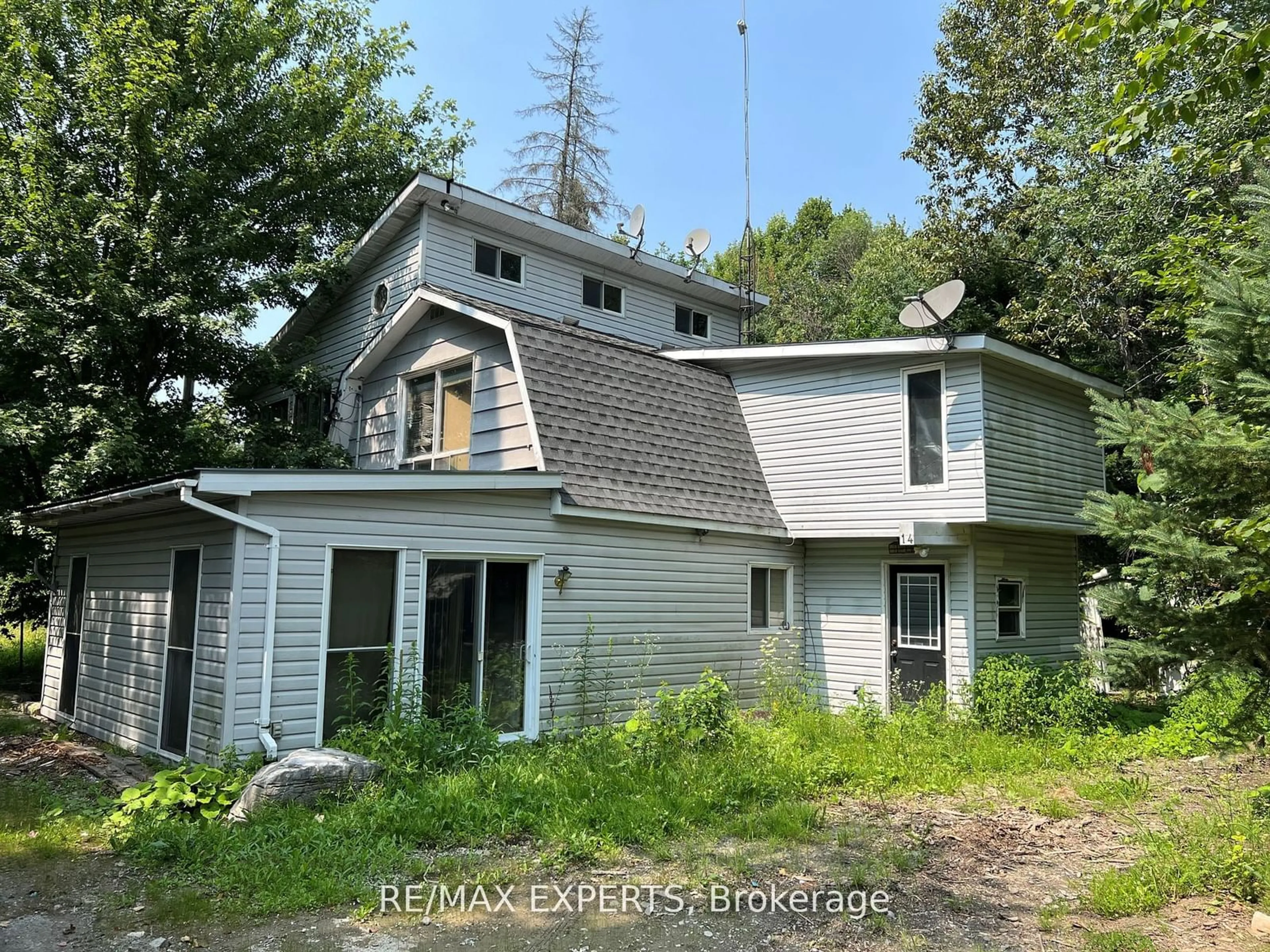 Frontside or backside of a home, cottage for 14 Sunset Lane, Kawartha Lakes Ontario K0M 1N0