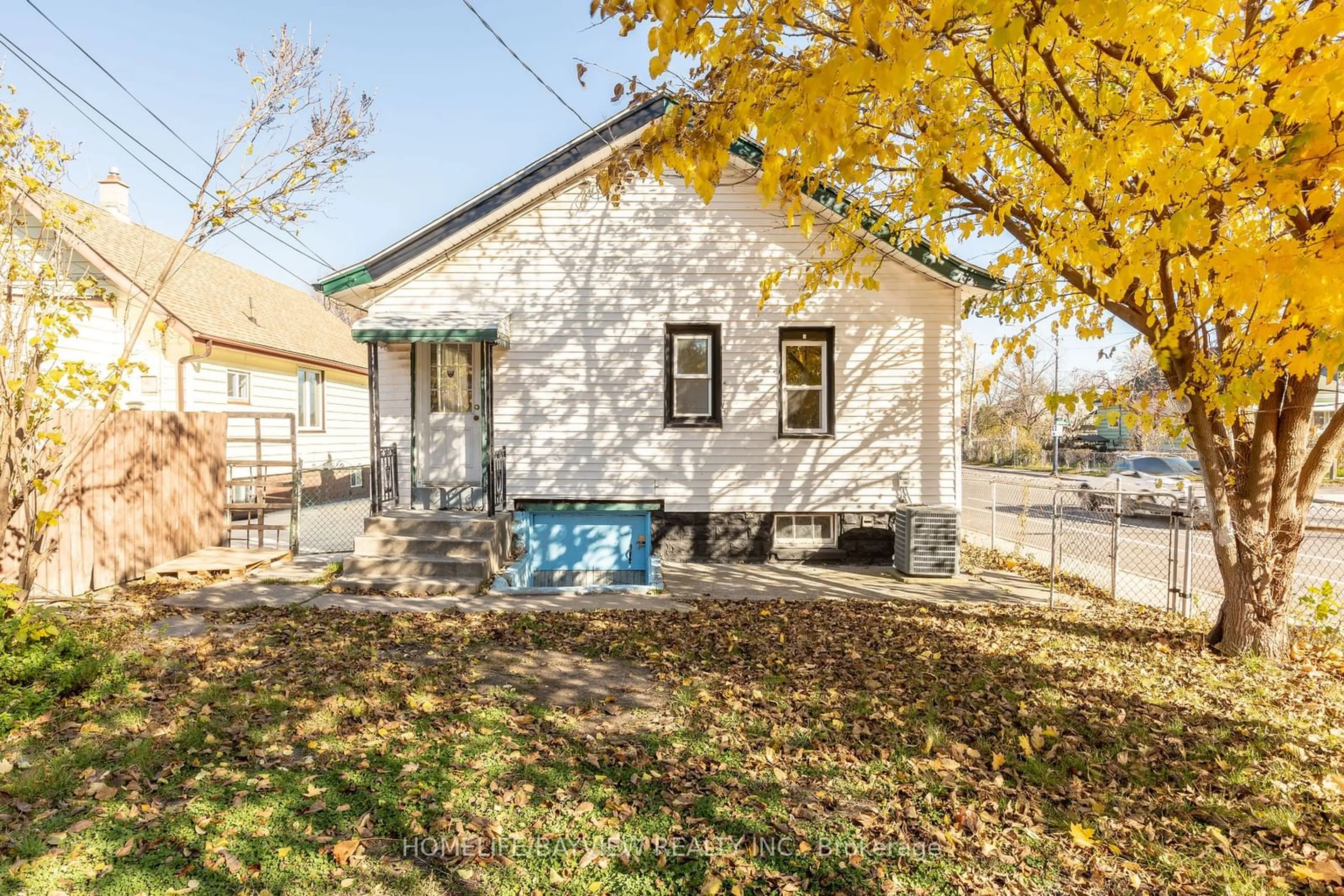 A pic from exterior of the house or condo, the fenced backyard for 1343 Lillian Ave, Windsor Ontario N8X 4A4