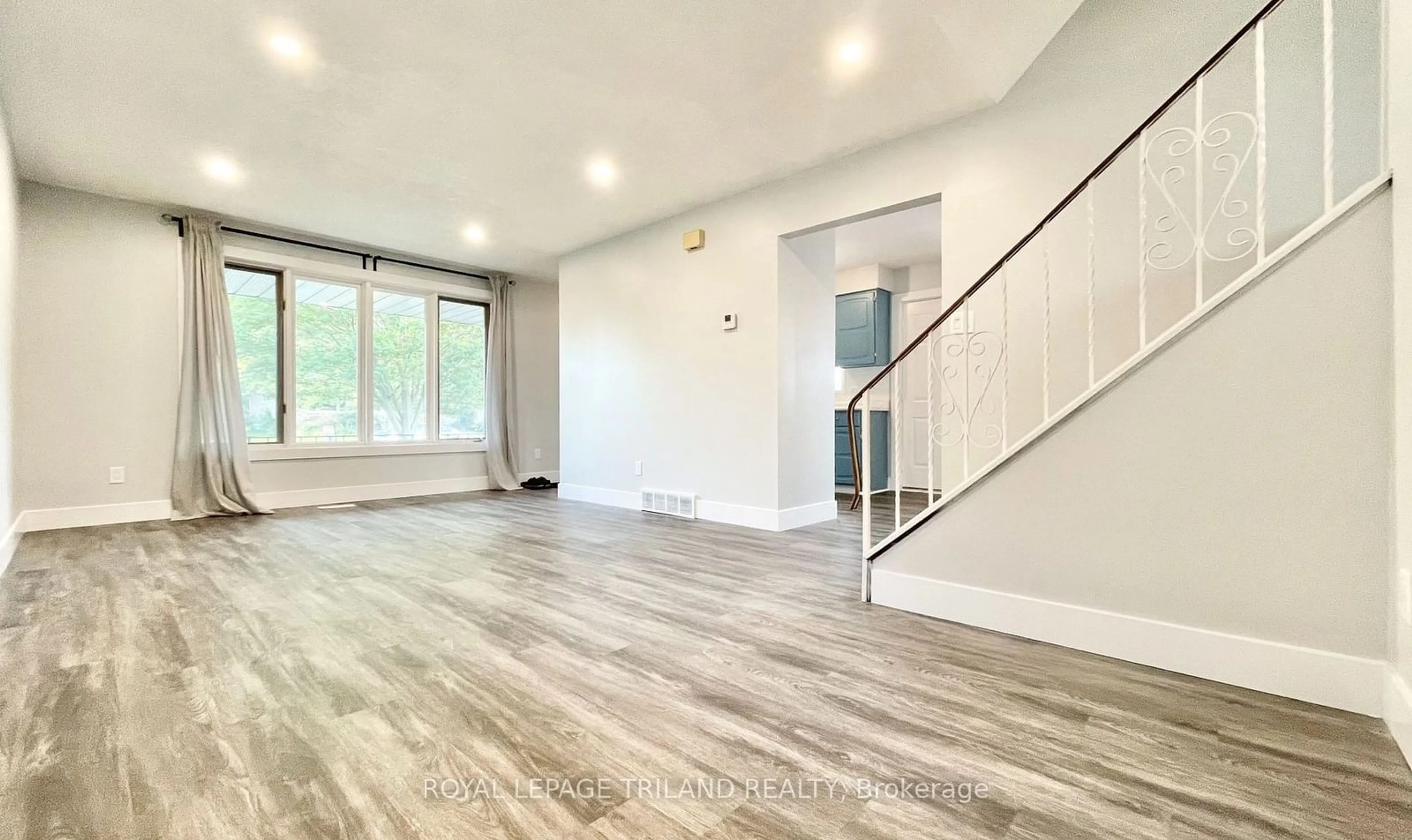 A pic of a room, wood floors for 65 Manor Rd, St. Thomas Ontario N5R 5R3