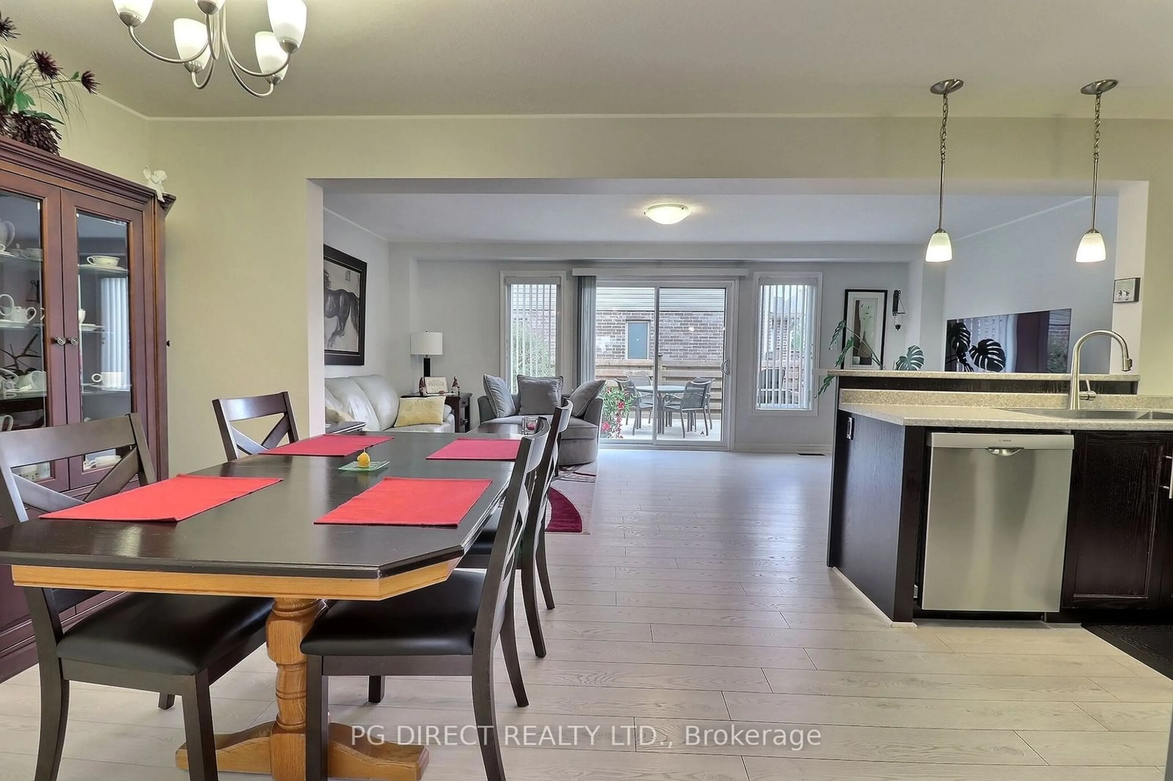 Dining room, wood floors, cottage for 2031 Pennyroyal St #29, London Ontario N5X 0L7