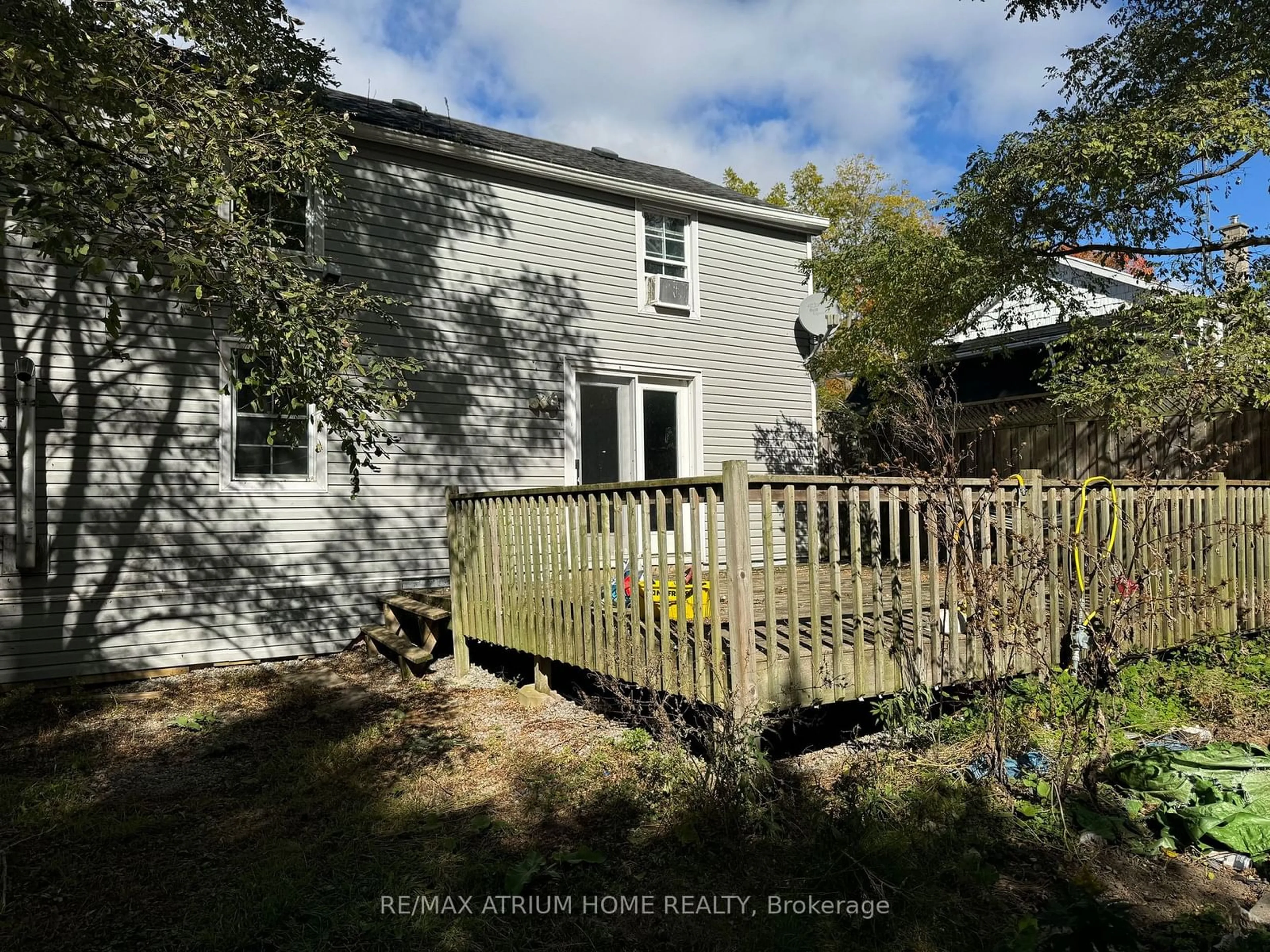 Frontside or backside of a home, the fenced backyard for 4013 Lakeshore Rd, Port Hope Ontario L1A 3V7